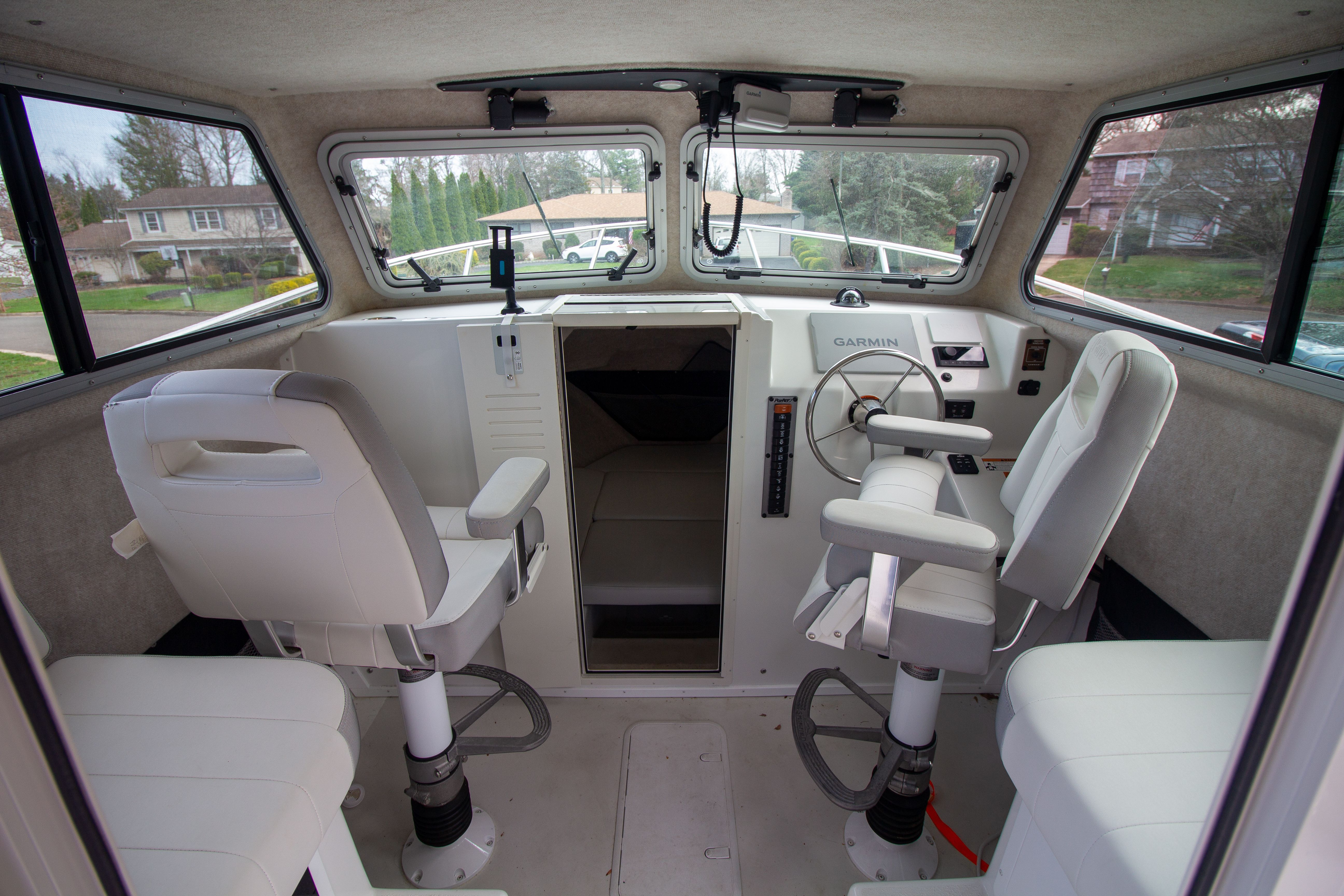 Interior of 2022 Parker 2520 XLD Sport Cabin with helm console.