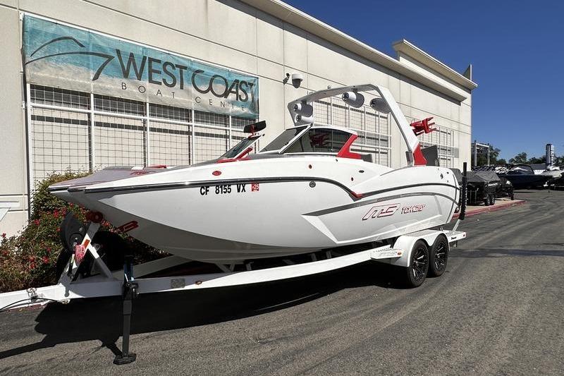 2023 MB SPORTS F22 Tomcat Alpha boat on trailer at West Coast Boat Center.