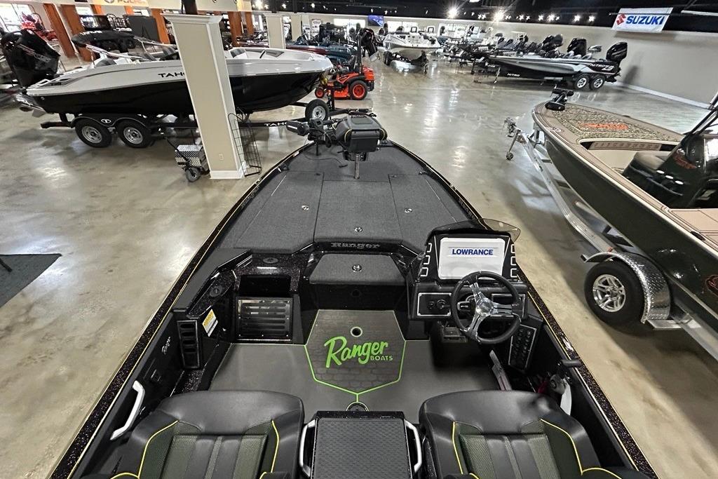 2025 Ranger Z519R Cup-Equipped boat interior at a showroom, featuring advanced navigation system.