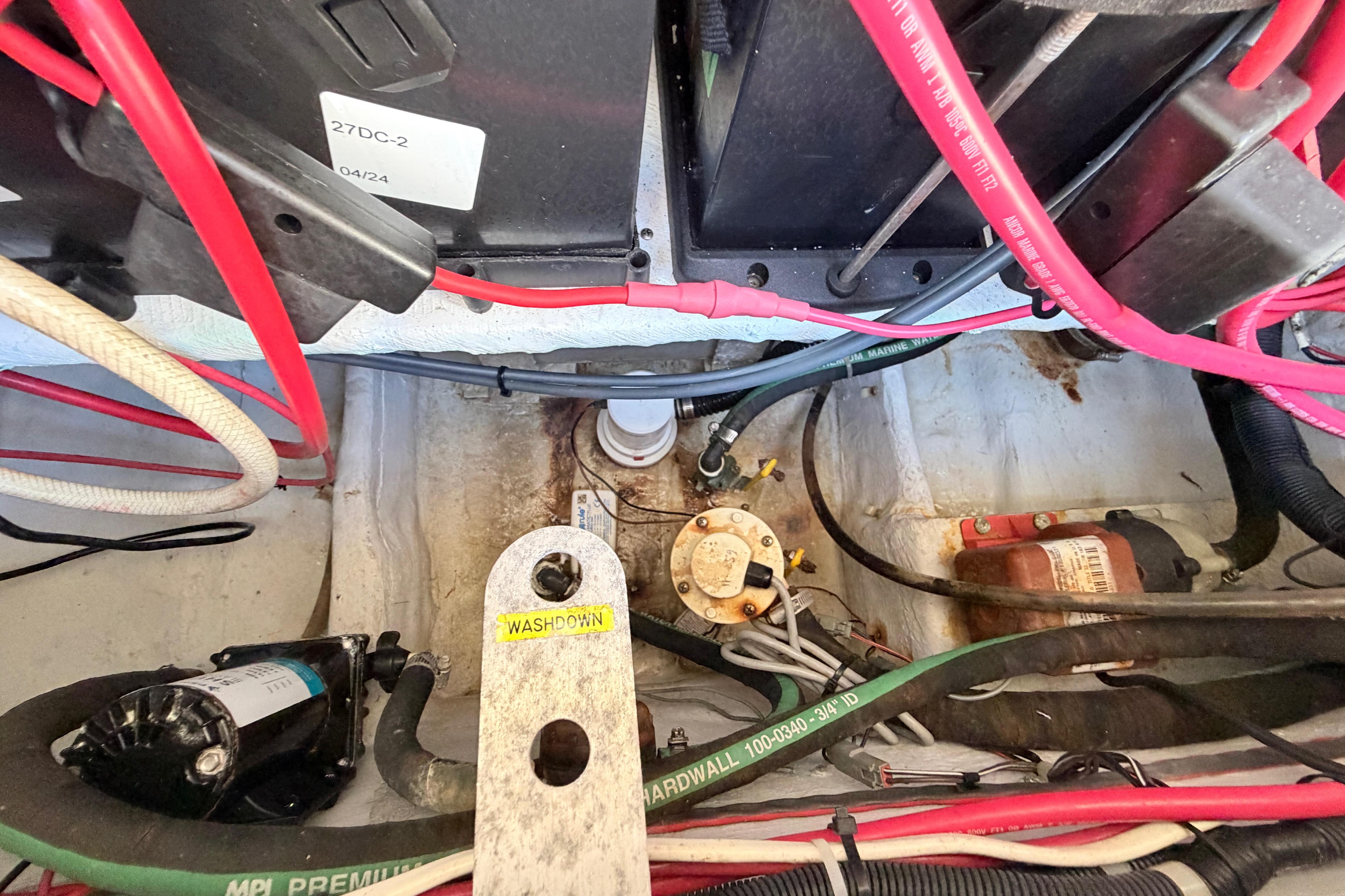 Electrical wiring and components inside a 2006 Grady-White Sailfish 282 boat.