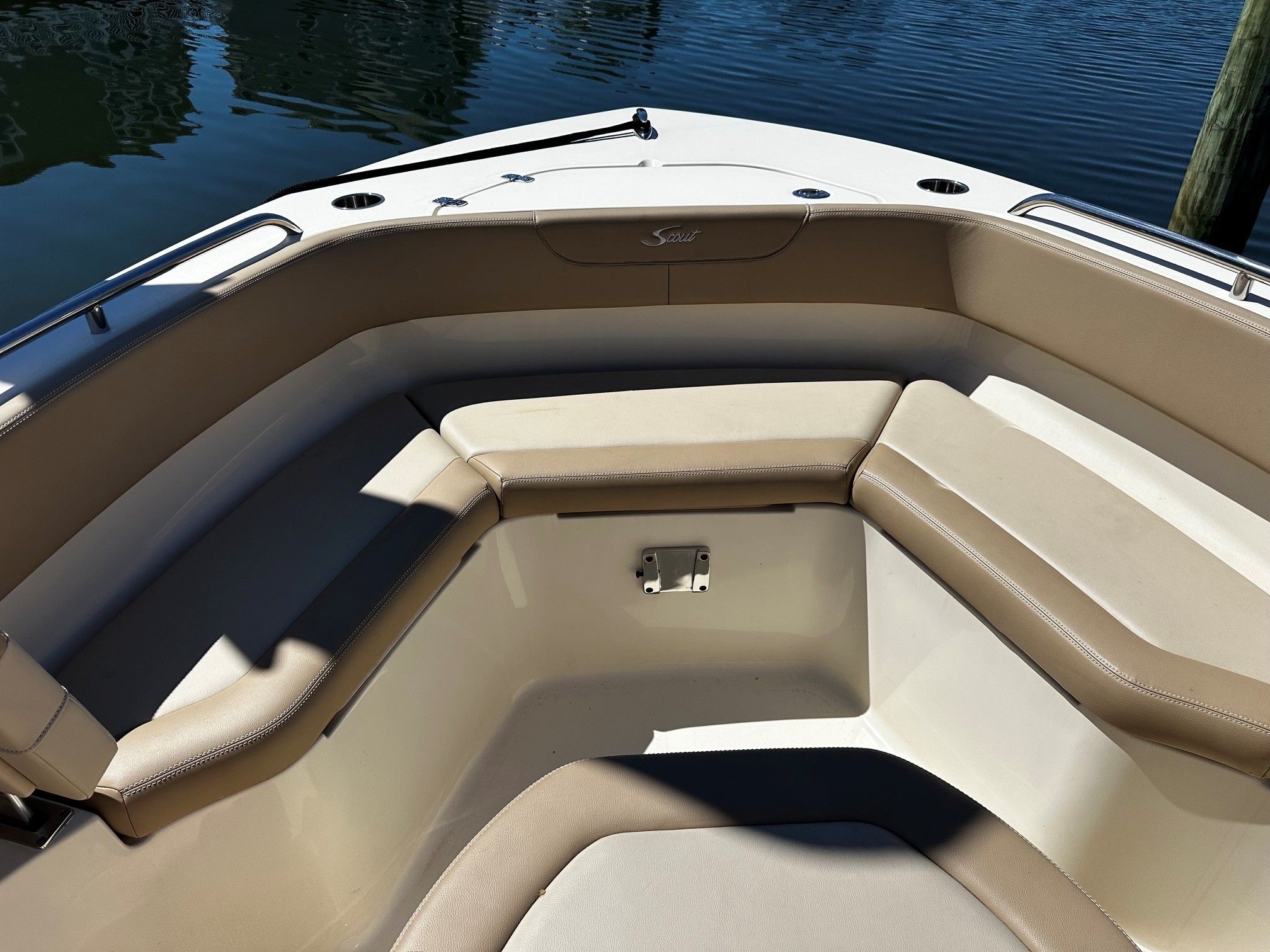 Interior view of a 2022 Scout 210XSF boat on the water.