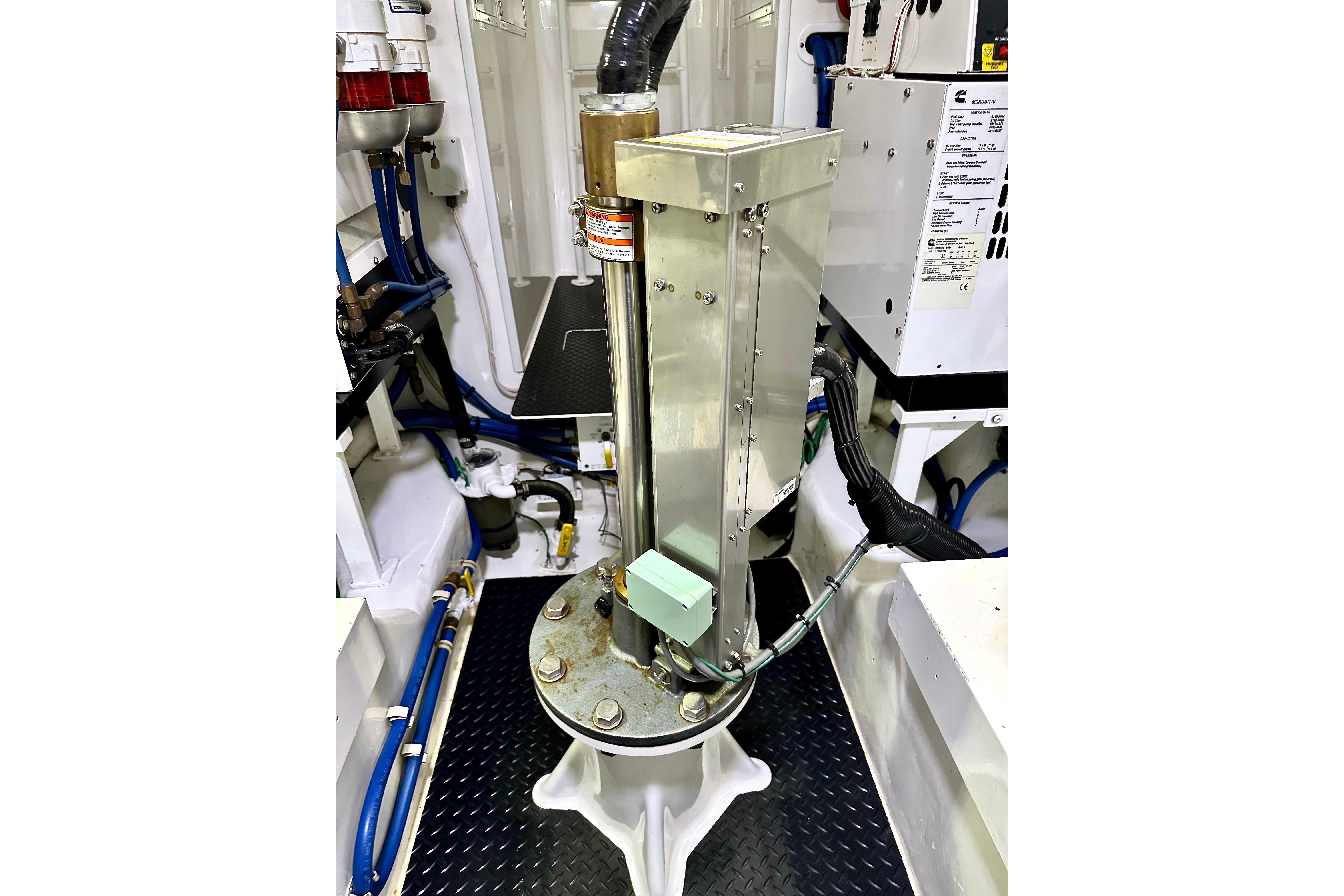 Engine room of 2019 Viking 68 Convertible yacht with mechanical equipment.