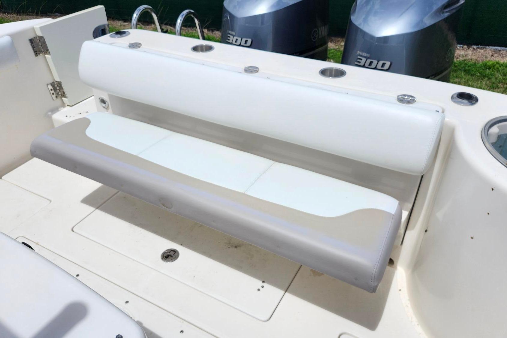 2015 Robalo R300 Center Console boat with foldable seating and dual Yamaha 300 engines.
