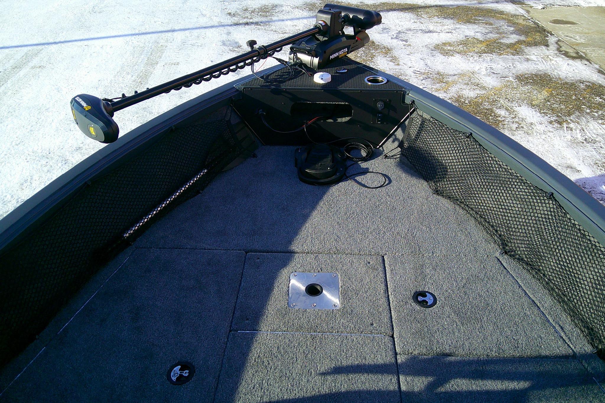 2026 Ranger VS1882SC Reata boat deck with trolling motor and carpeted surface.