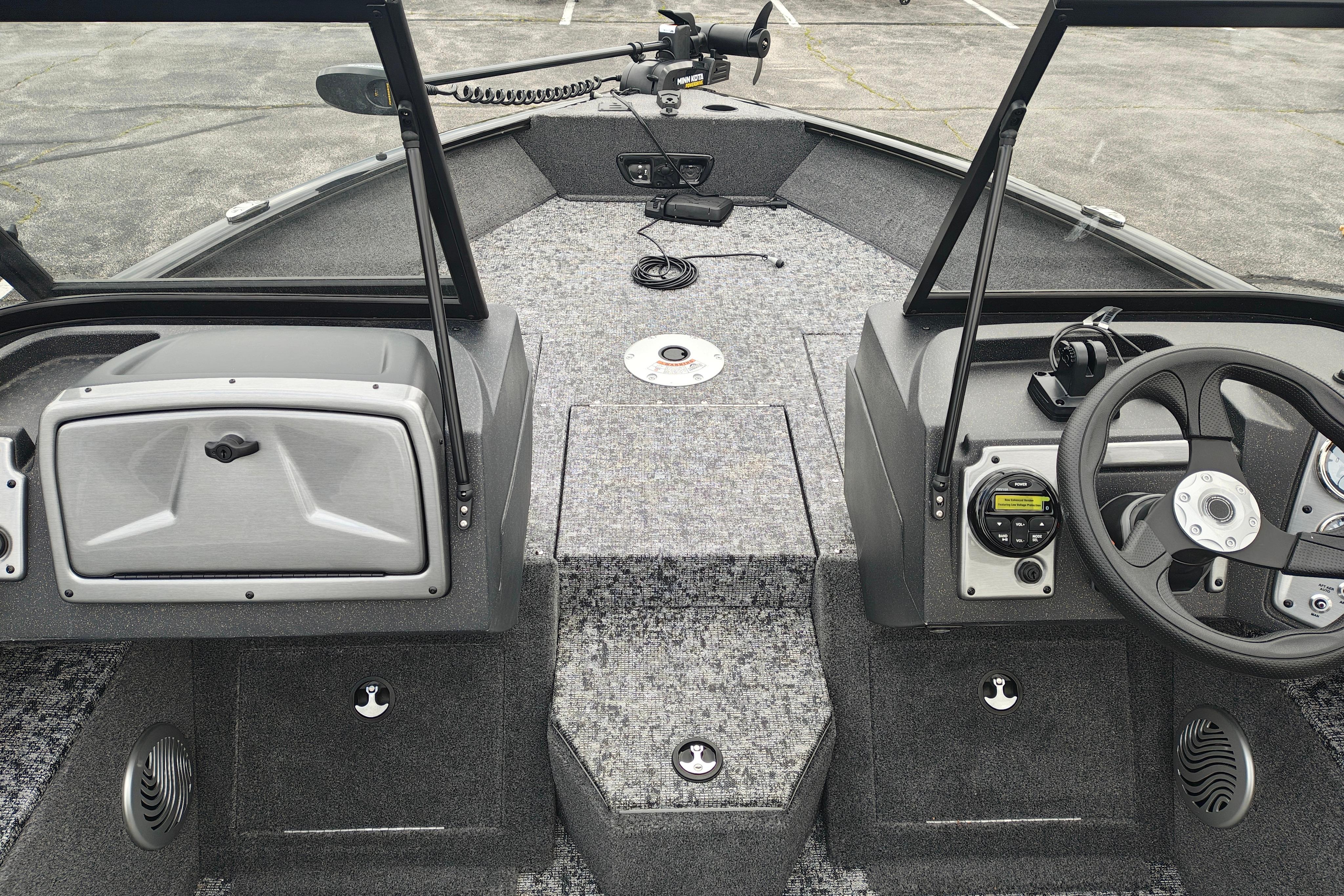 2026 Tracker Pro Guide V-175 WT boat interior with steering wheel and control panel.