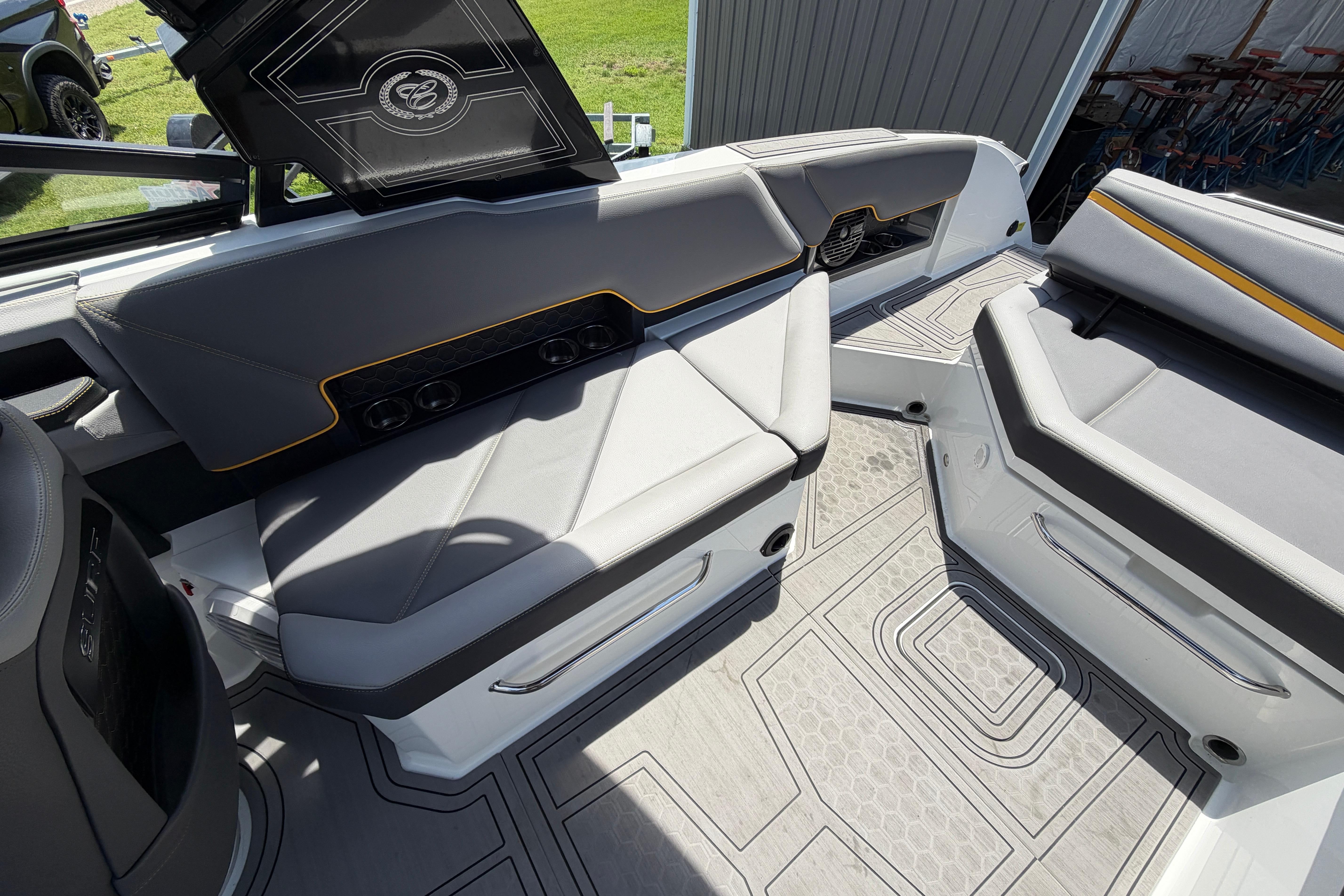 Interior of 2021 Cobalt R8 Surf boat with sleek gray seating and modern design.