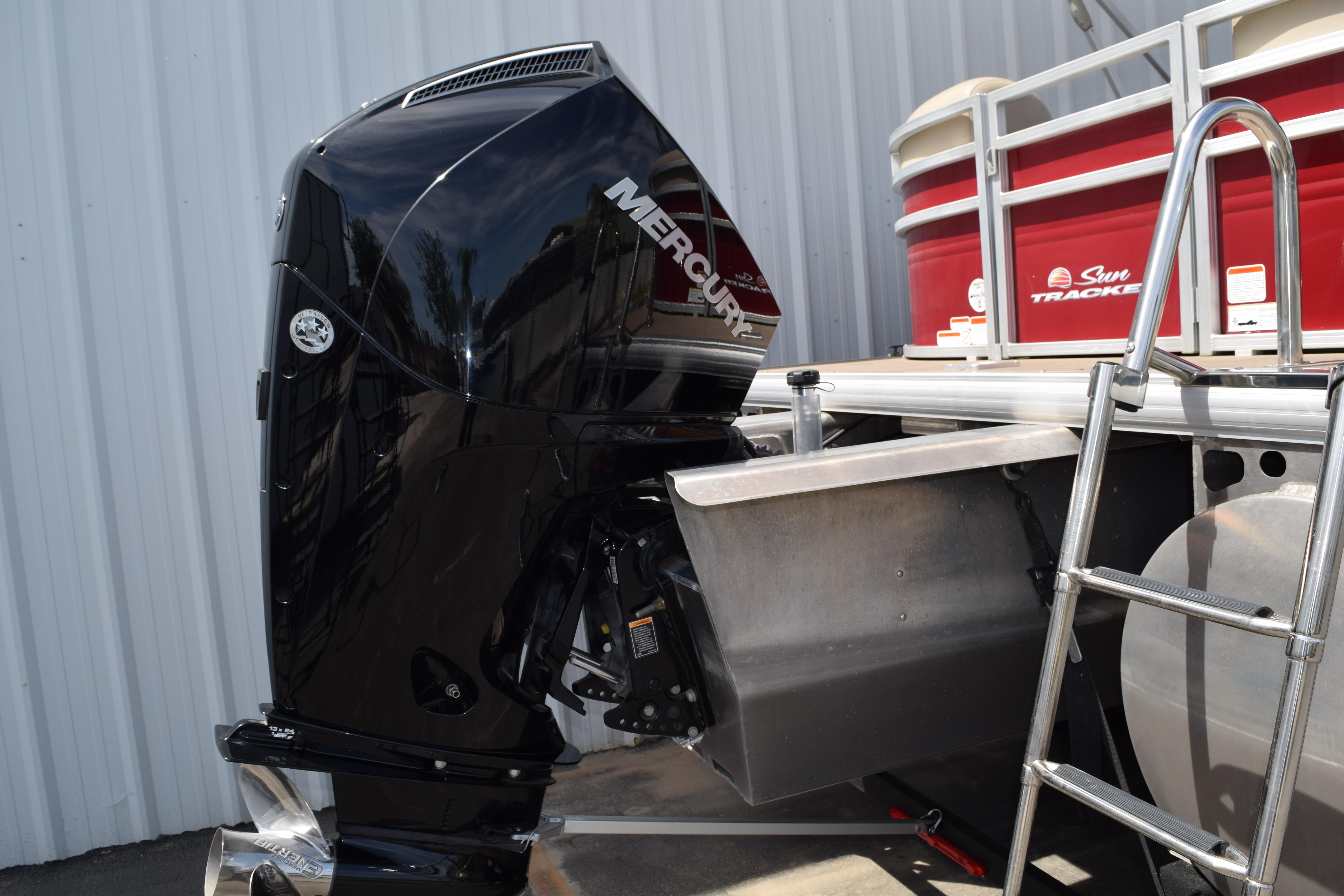 2025 Sun Tracker Party Barge 22 XP3 with Mercury outboard motor and ladder.