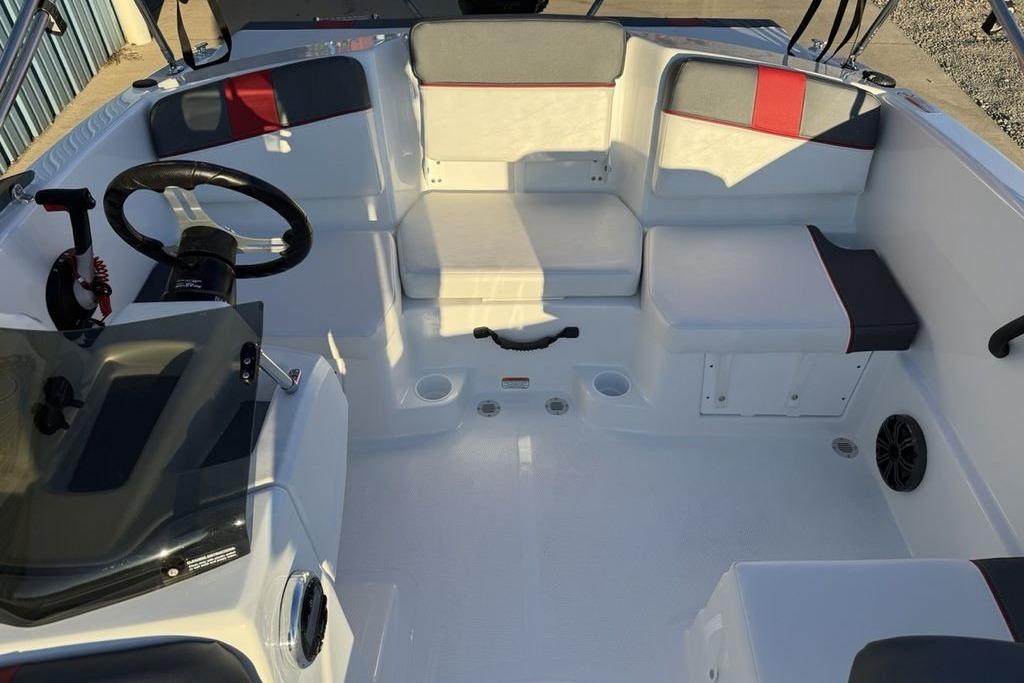 Interior of 2026 Tahoe T16 boat with seating and steering wheel.