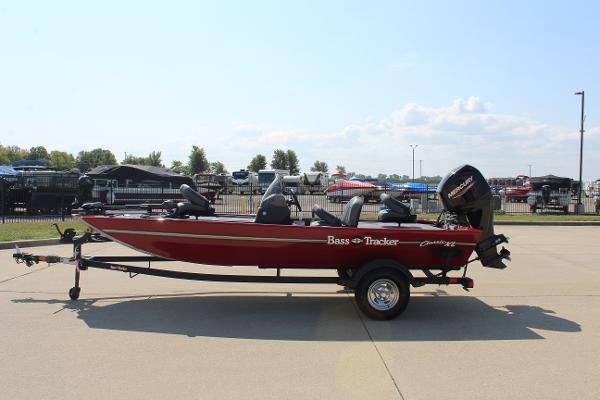 2025 Tracker Bass Tracker Classic XL boat on trailer, parked outdoors.