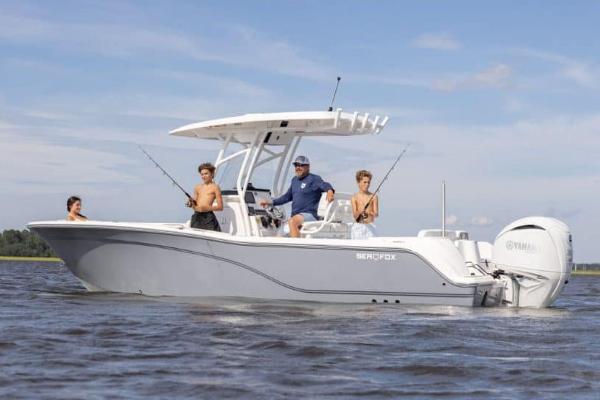Manufacturer Provided Image: 2025 Sea Fox 248 Commander boat with people fishing on calm waters.