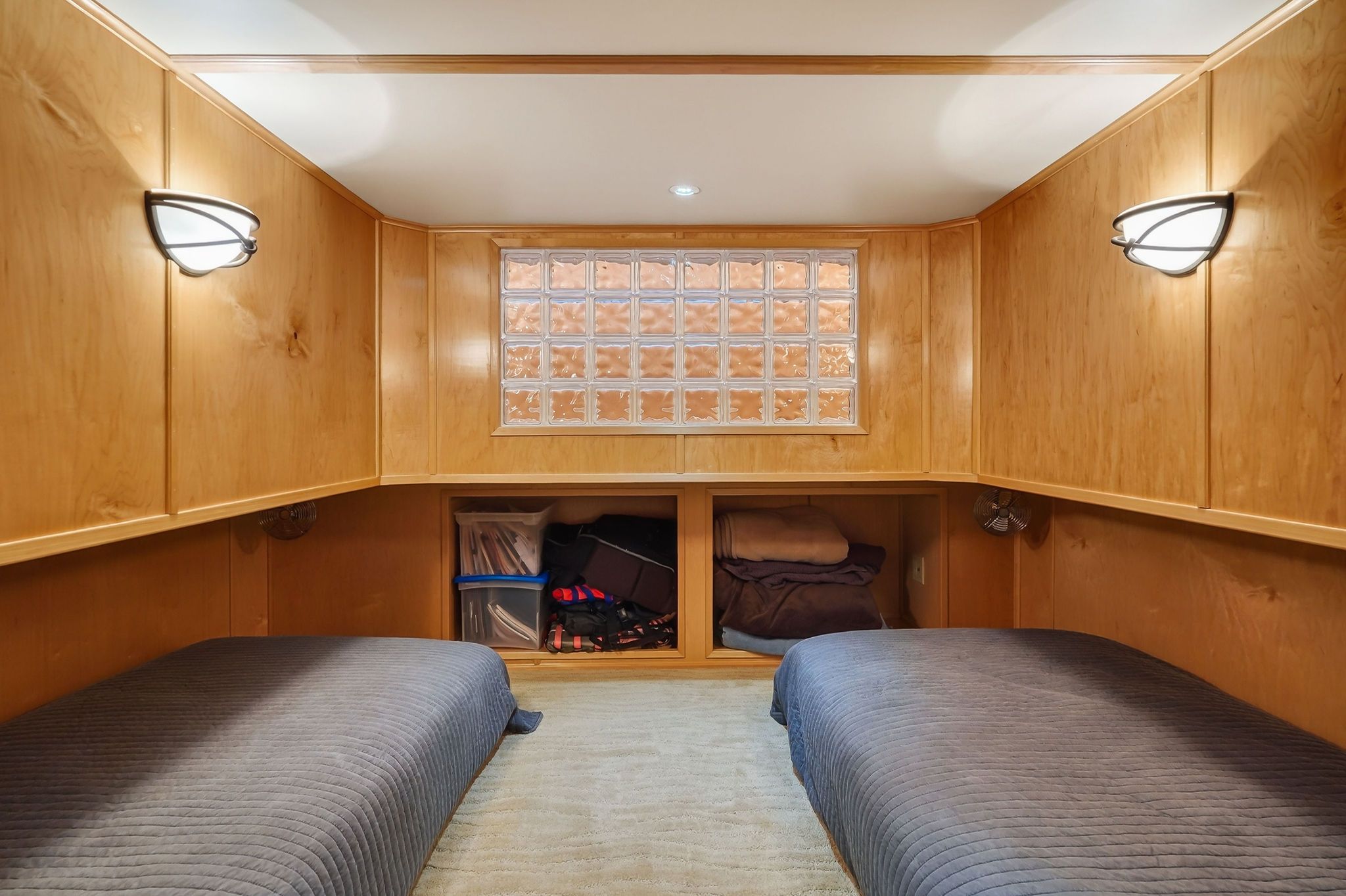 Interior of a 2010 Houseboat Throughbred cabin with two beds.