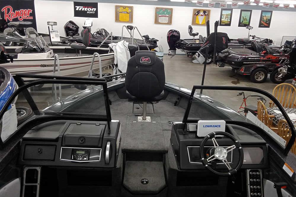 Interior view of a 2026 Ranger VX1888 WT boat in a showroom.
