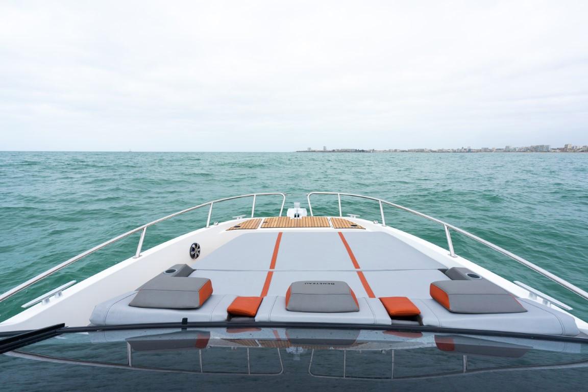 2024 Beneteau Flyer 10 boat cruising on open water.