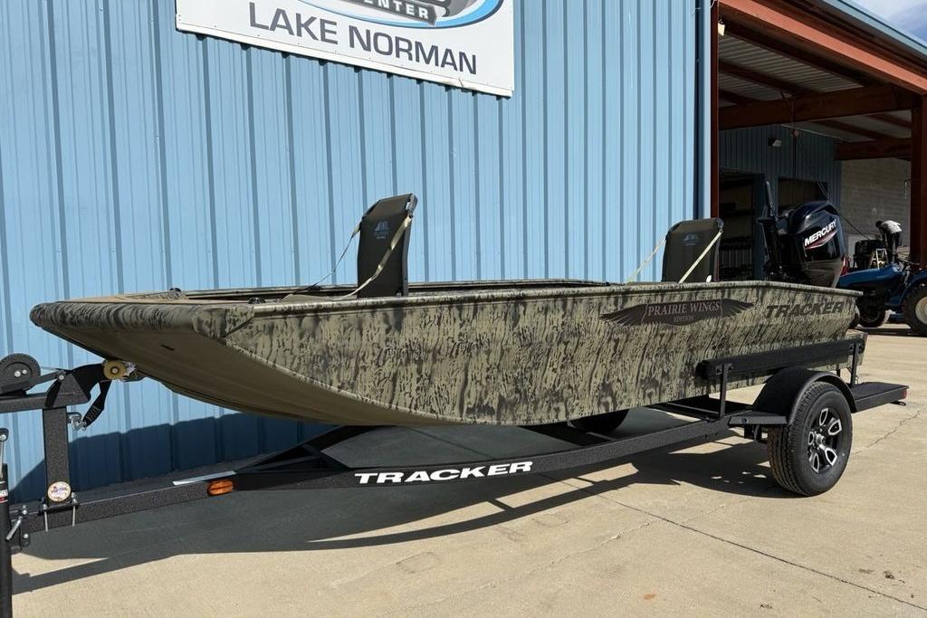 2026 Tracker Grizzly 1650 T Prairie Wings Edition boat on trailer at Lake Norman.