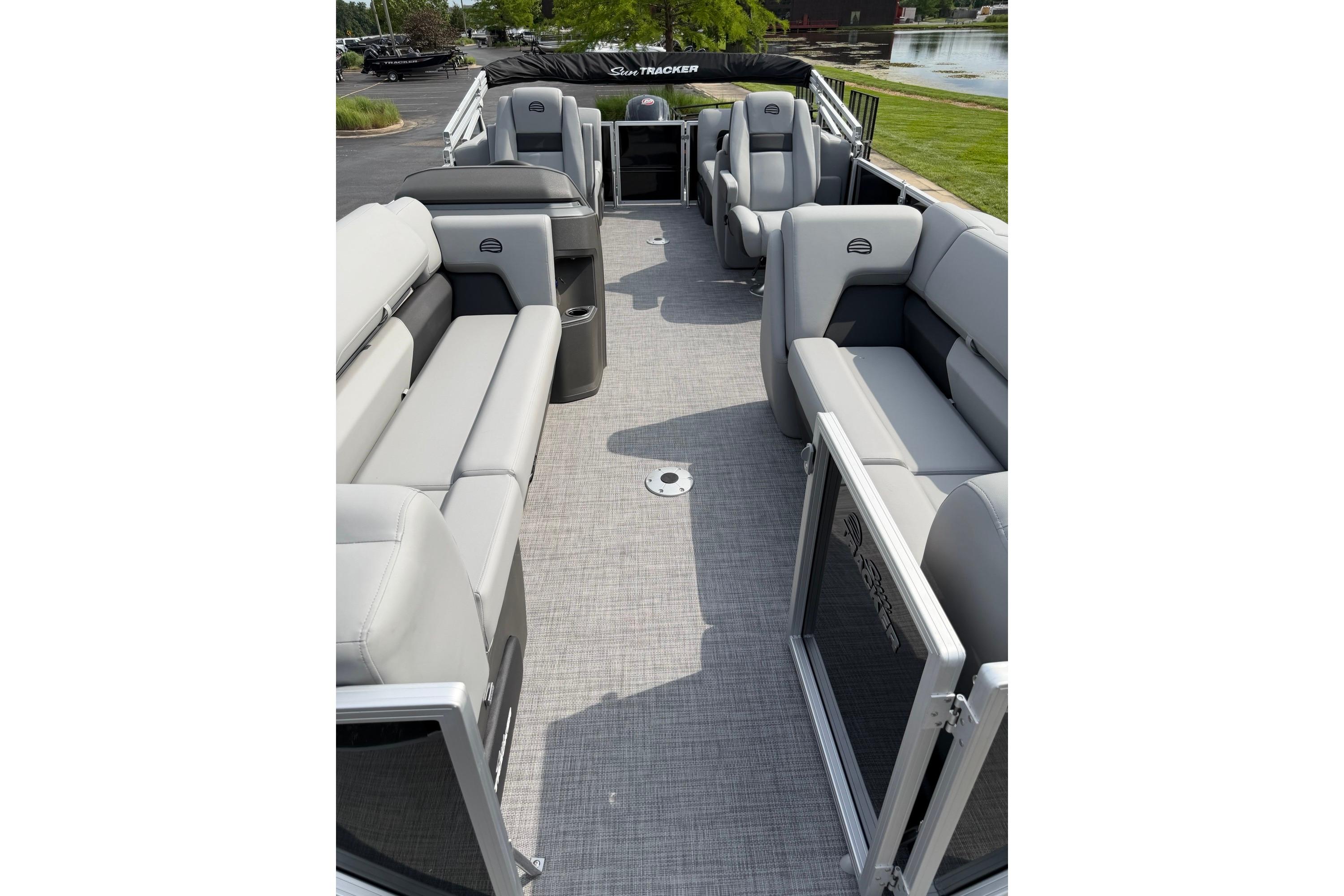 2026 Sun Tracker Party Barge 22 DLX interior with spacious seating and modern design.