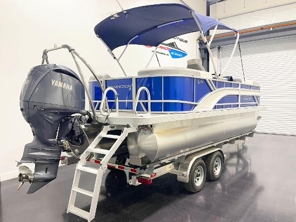 2025 Bennington 20S pontoon boat with Yamaha outboard motor on trailer.