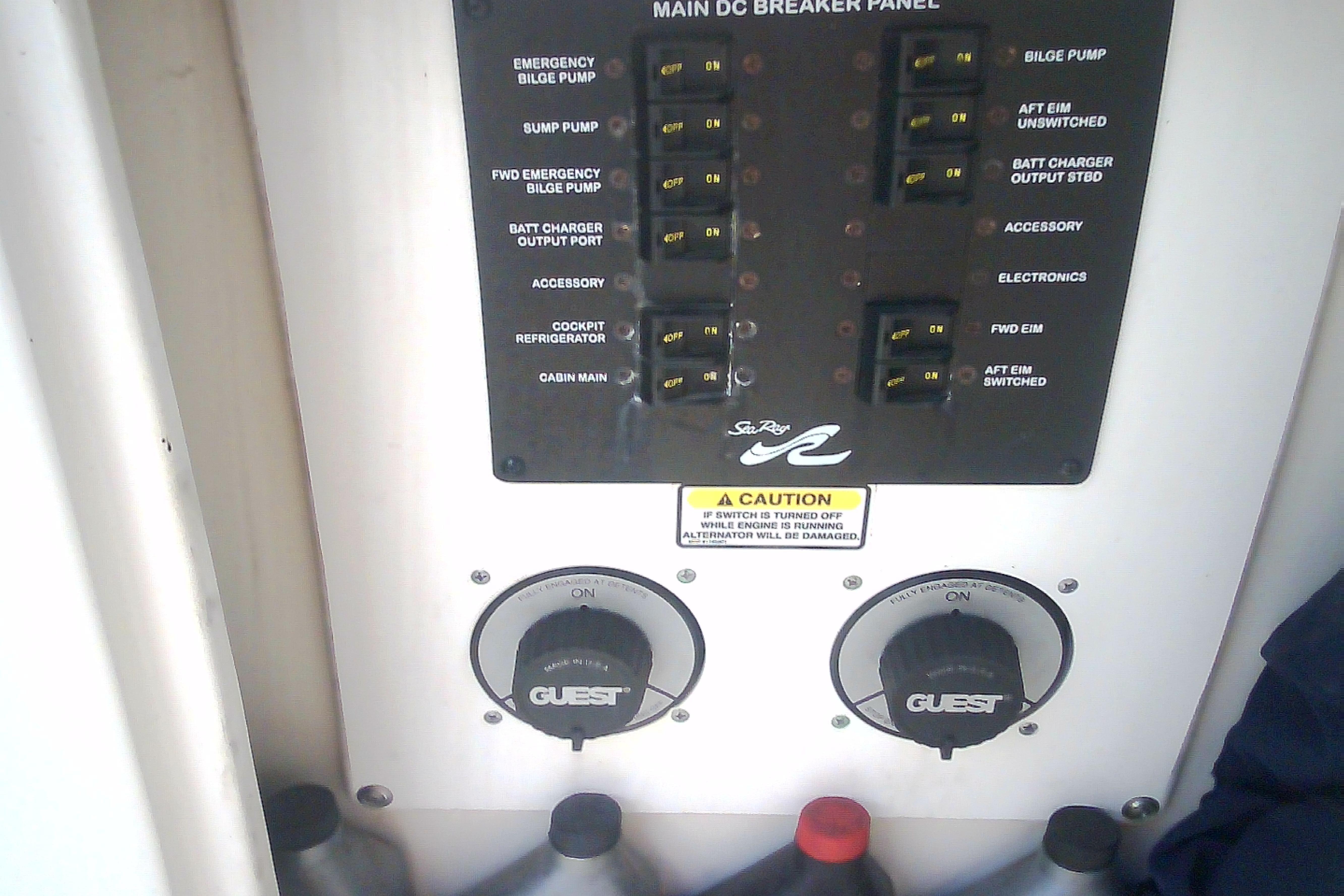 Main DC breaker panel on 2005 Sea Ray 300 Sundancer boat, featuring various switches and controls.