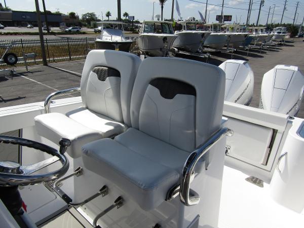 2024 Wellcraft 263 Fisherman boat seats and steering wheel.