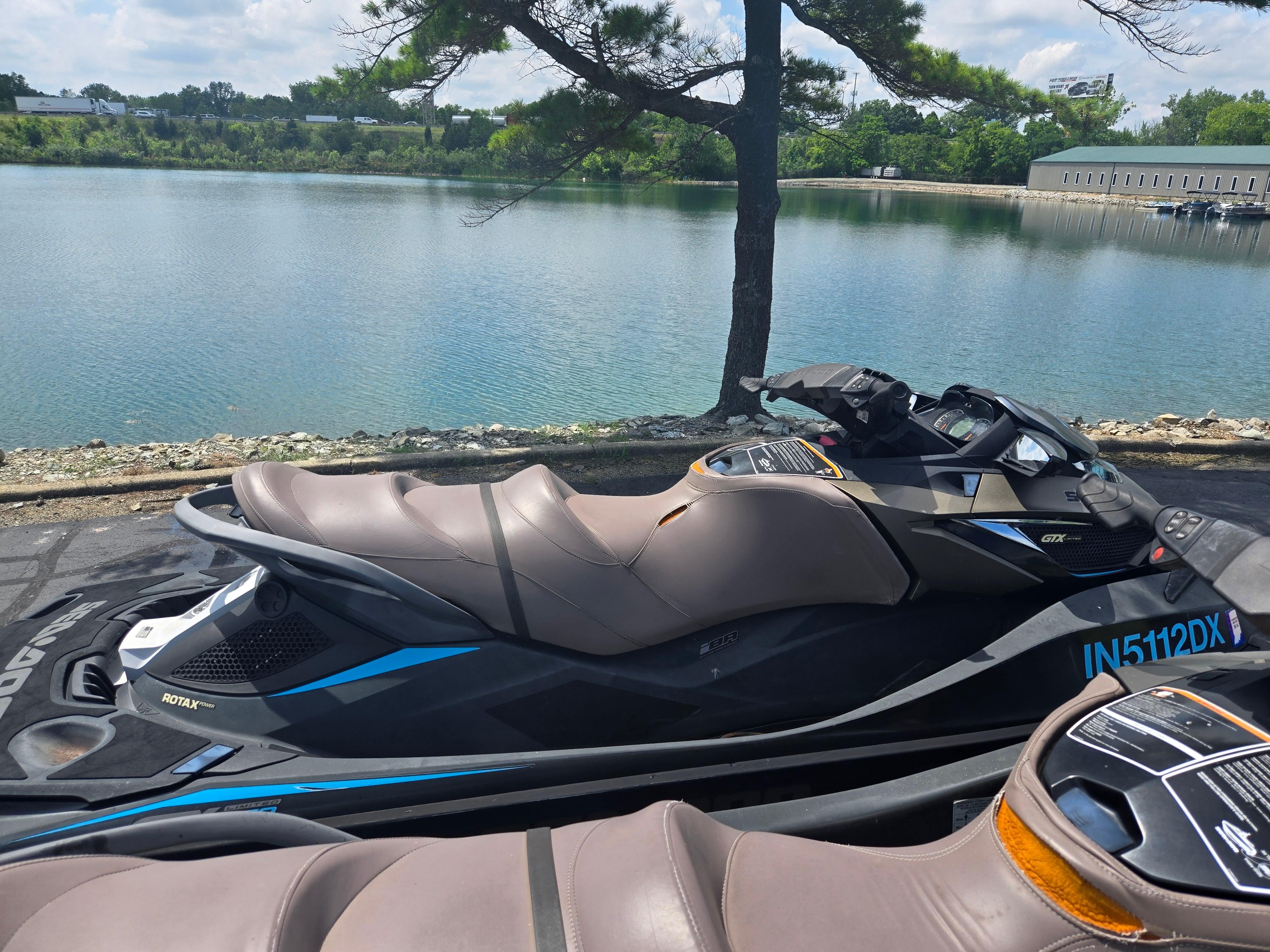 2016 Sea-Doo GTX Limited iS 260 jet ski by a serene lake.