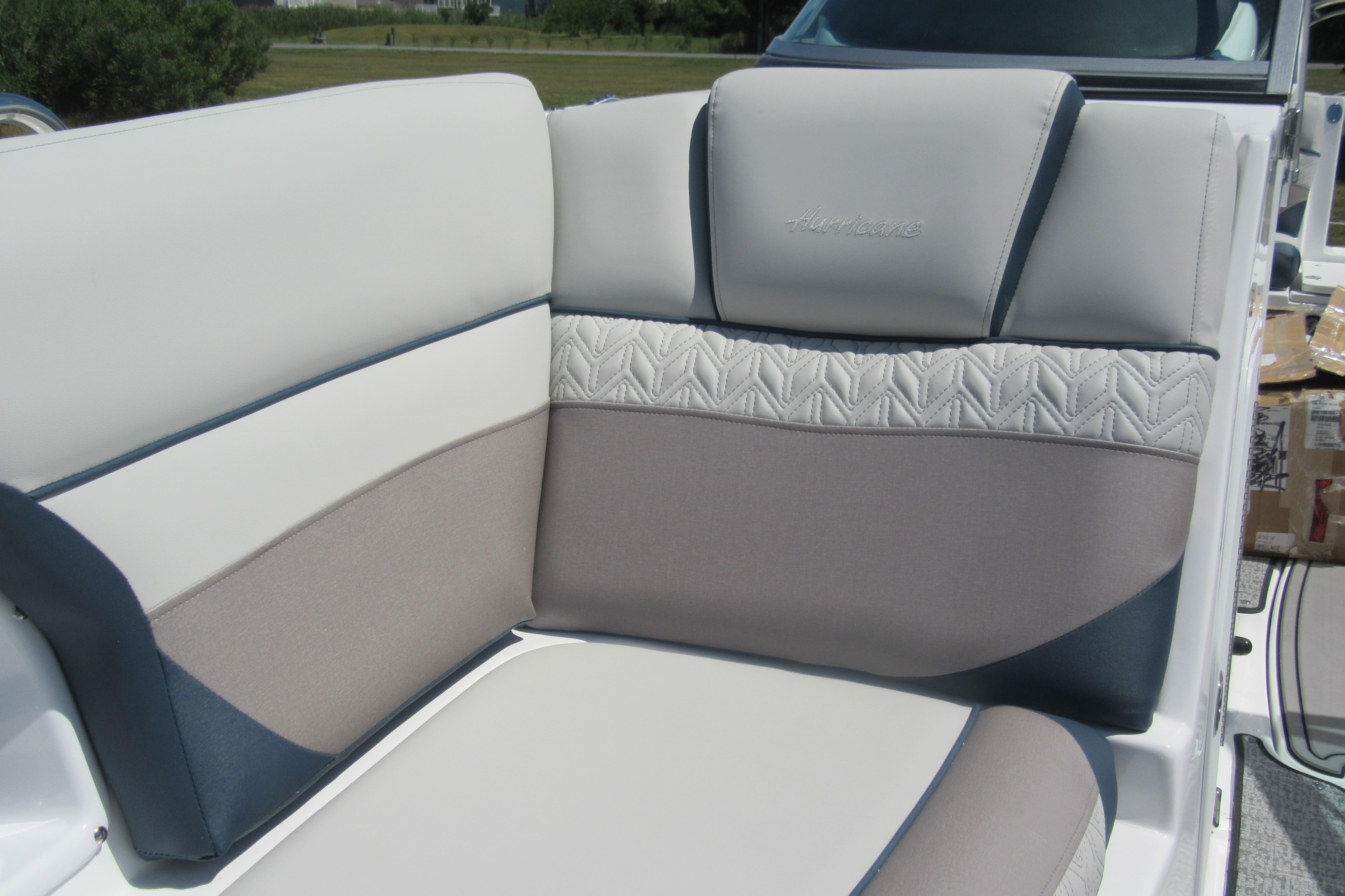 2027 Hurricane SunDeck 2486 OB boat seating with elegant, cushioned upholstery design.