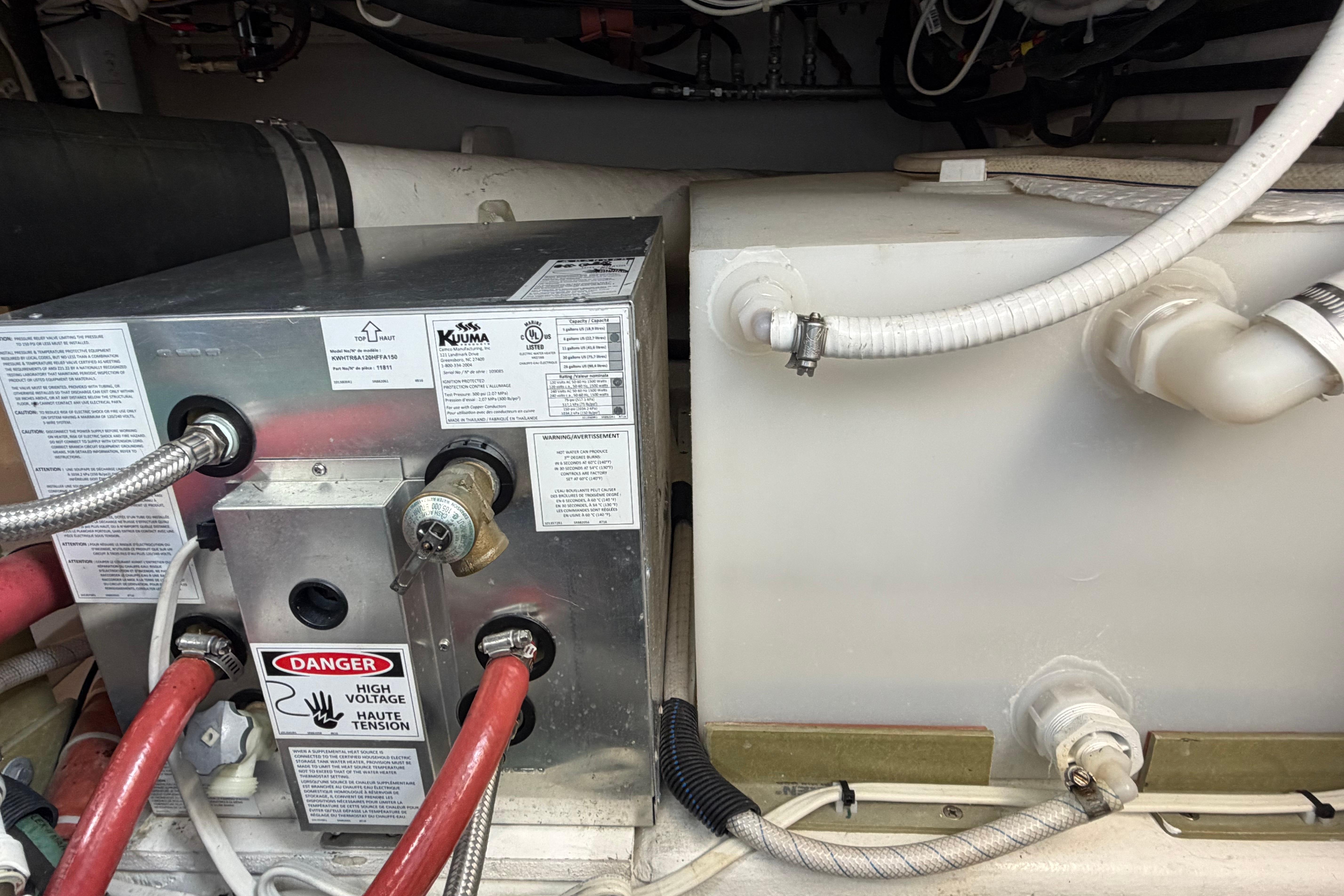 Engine room of 2018 H&H Marine Osmond Beal with electrical and plumbing components.