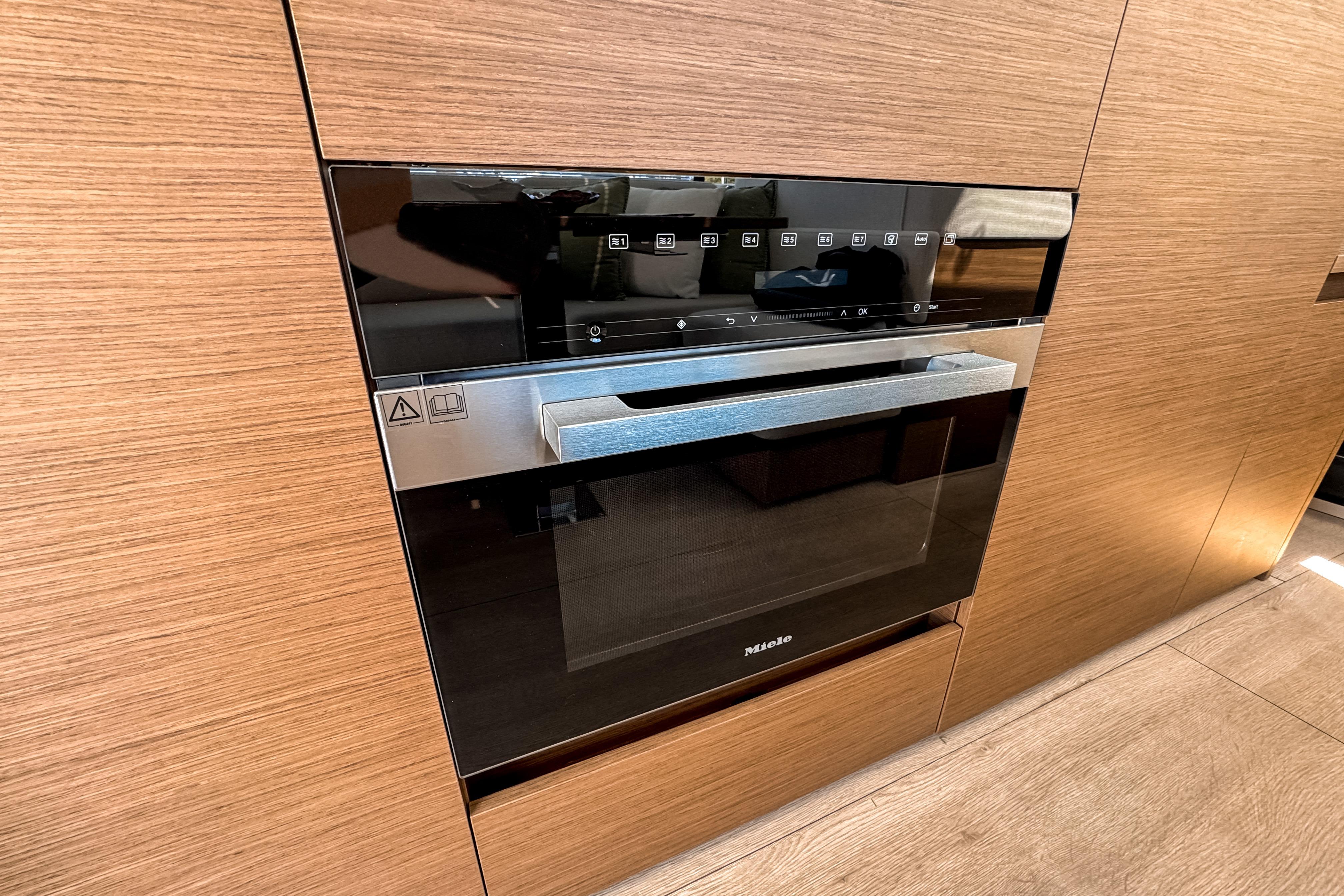 Modern Miele built-in kitchen in Wellcraft 44 Explorer 2026.