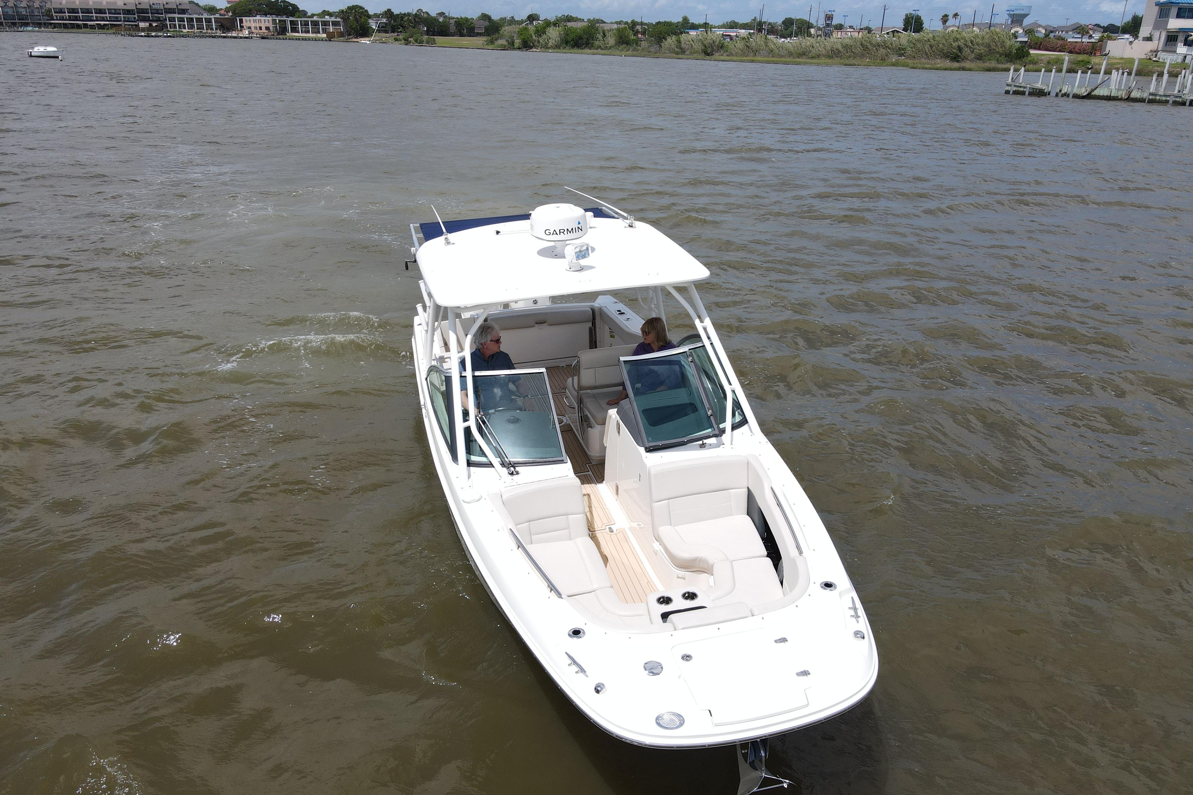 2017 Boston Whaler 270 Vantage showing off large bow seating area w/massive storage, anchor locker, drink holders & more