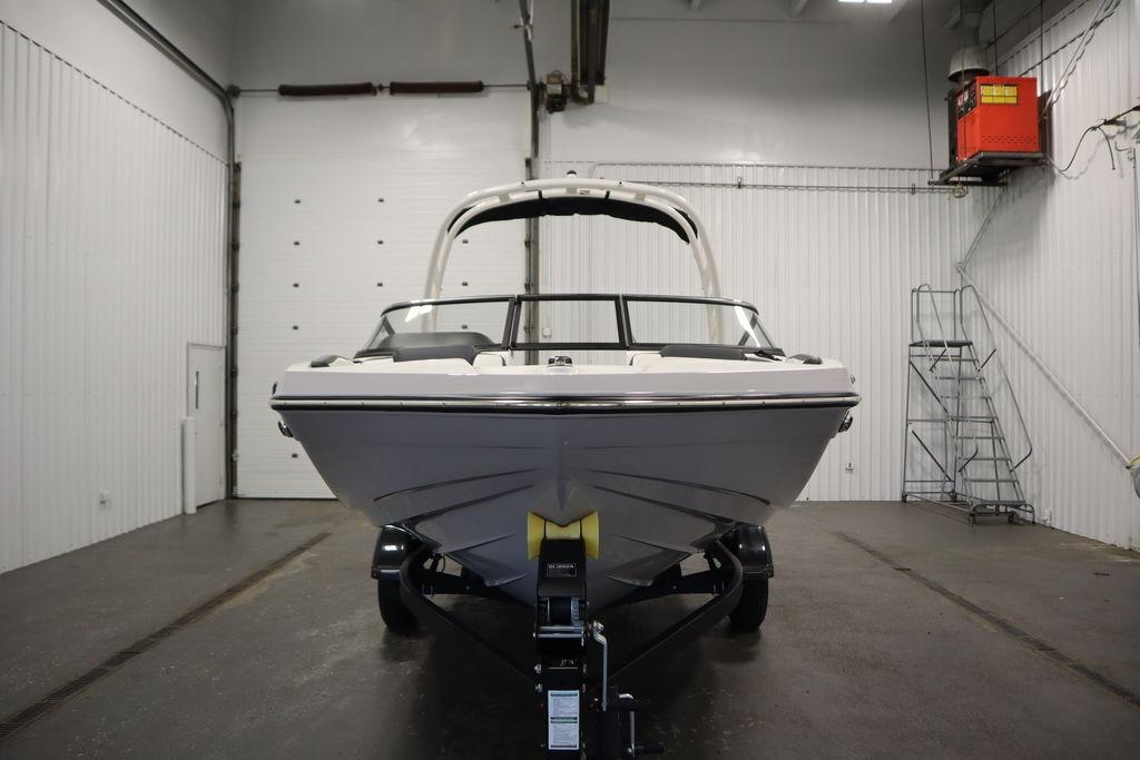 2026 Yamaha Boats 195S in indoor storage, front view.