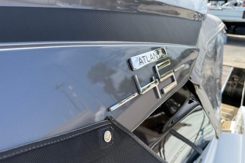 2023 Azimut Atlantis 45 yacht, close-up of model name on sleek exterior.