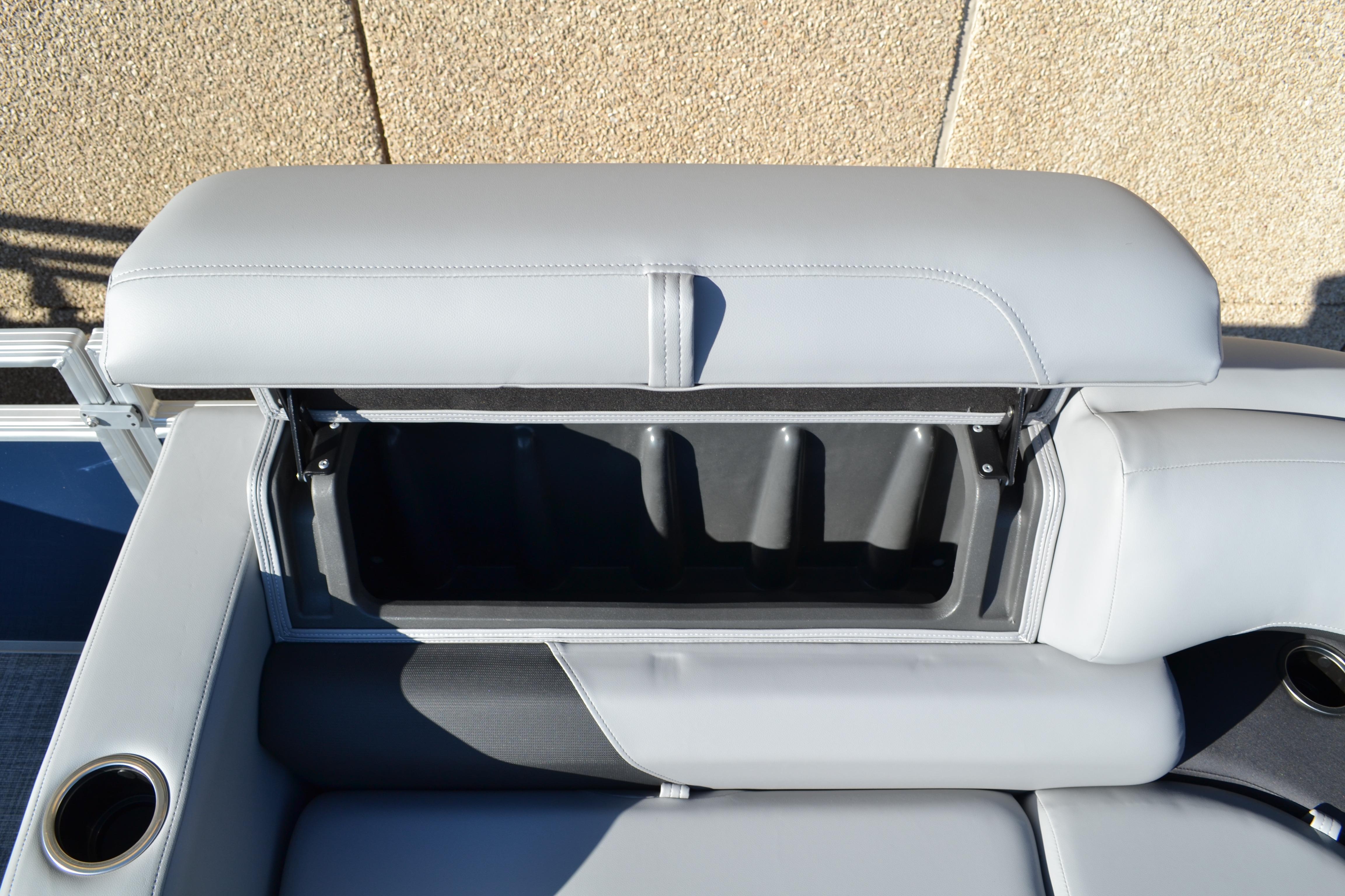 Sun Tracker SportFish 22 XP3 2026 boat seat with storage compartment open.