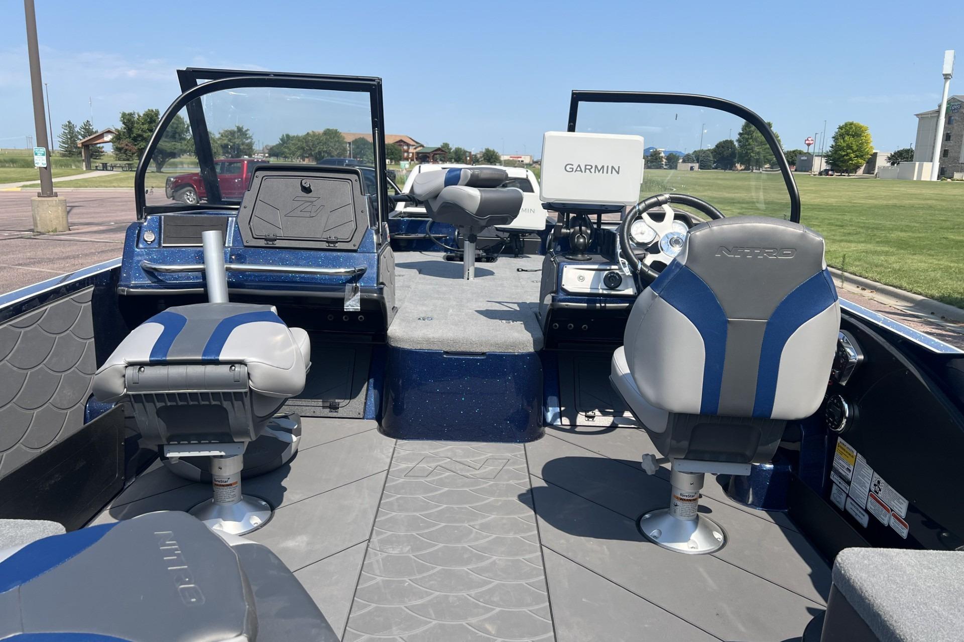 Interior of a 2026 Nitro ZV21 Pro boat with Garmin navigation system.