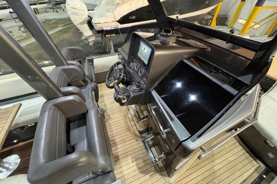 2021 Novamarine Black Shiver 100 cockpit with modern controls and leather seating.