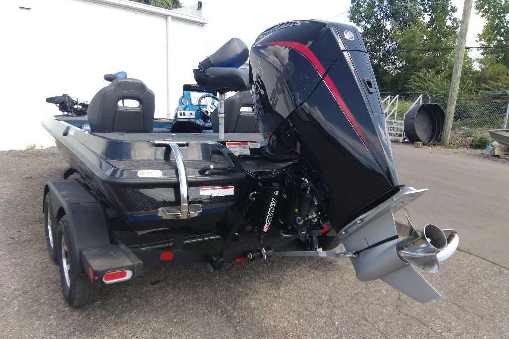 2026 Nitro Z19 XL Pro boat with powerful outboard motor, parked on a trailer.