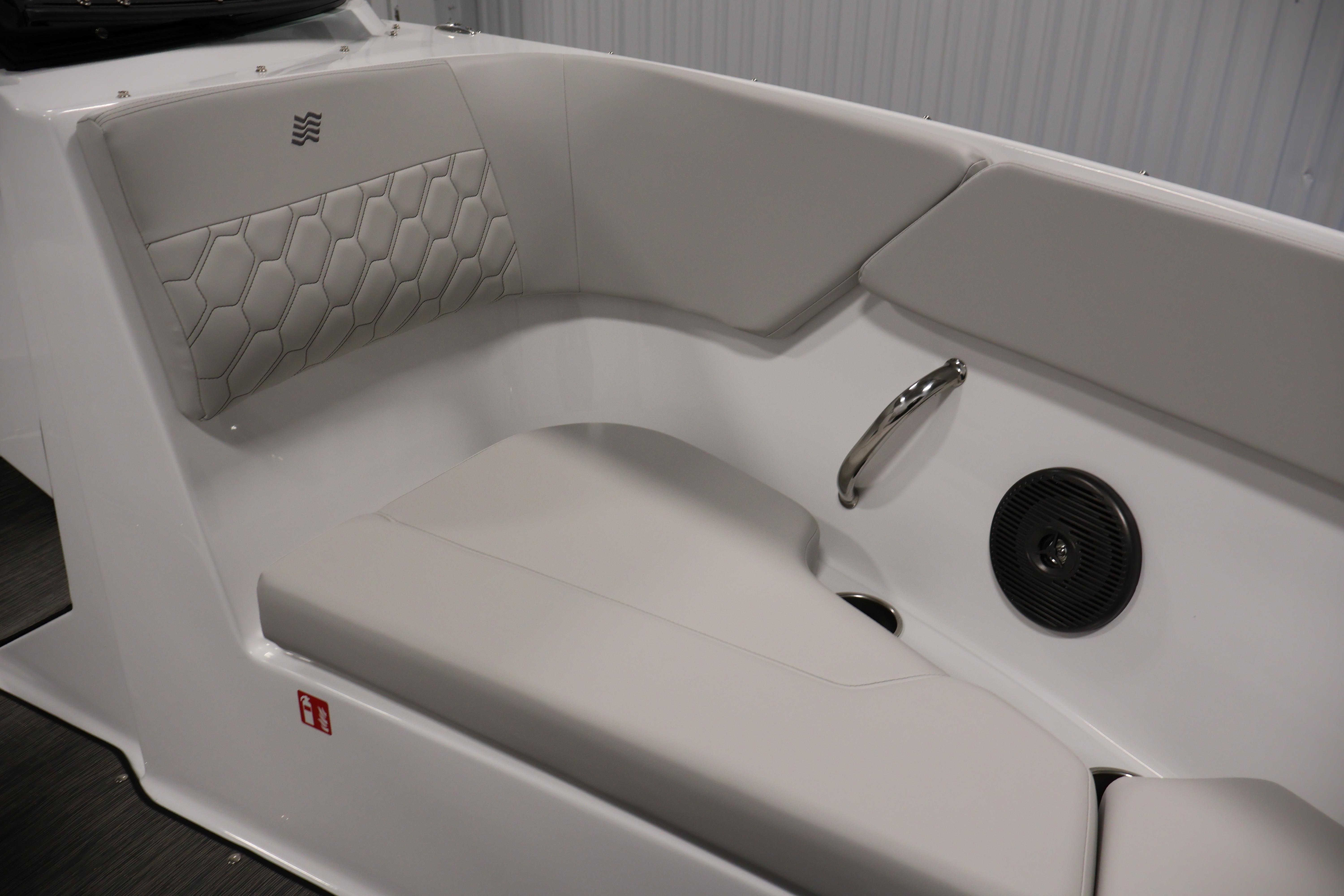 Luxurious interior seating of 2026 Four Winns H4 Freedom boat with modern design.