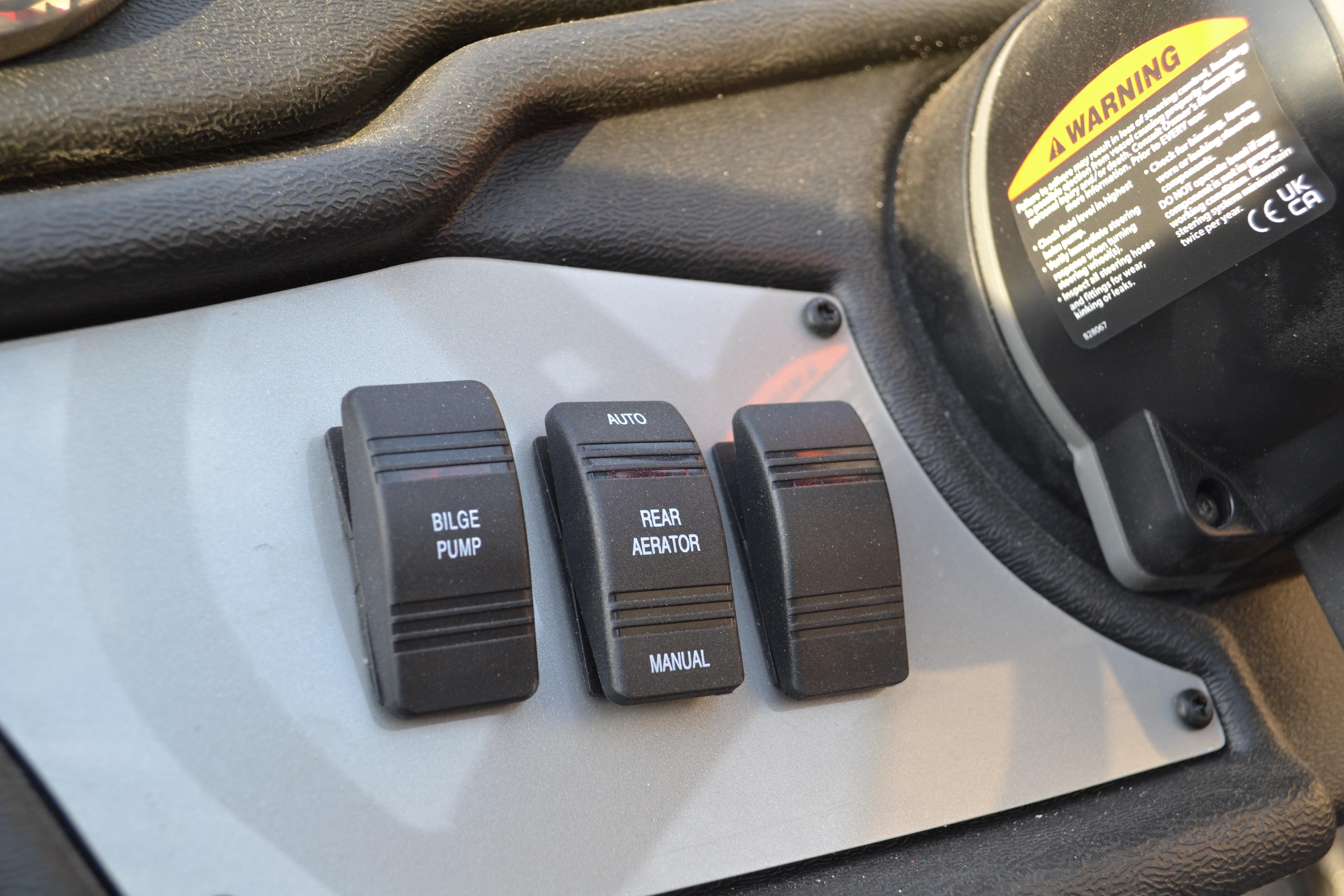 Control panel of 2026 Ranger RT188 with bilge pump and aerator switches.