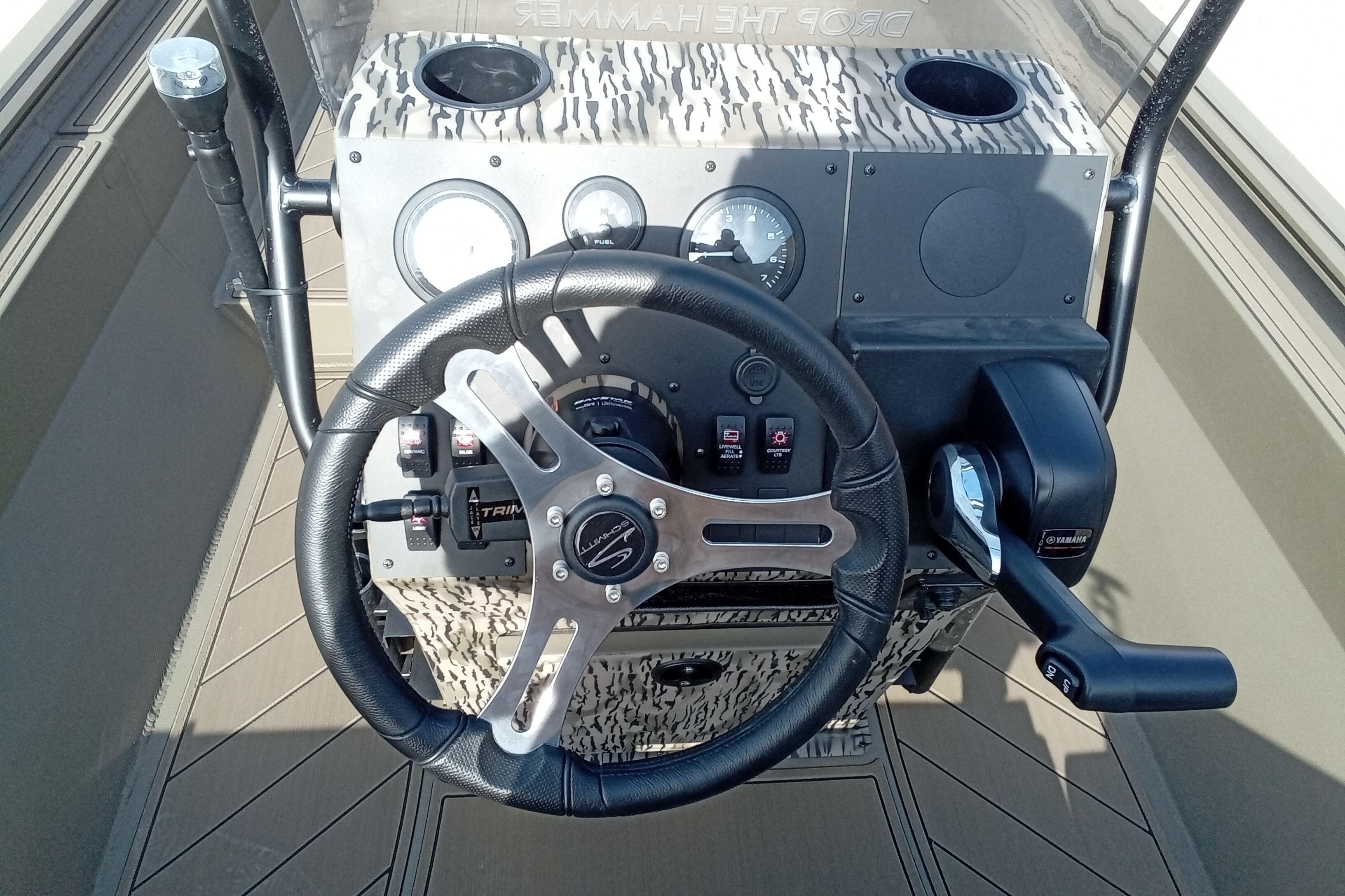 Steering console of 2026 Thor 1900 Low Country Elite boat with controls and gauges.