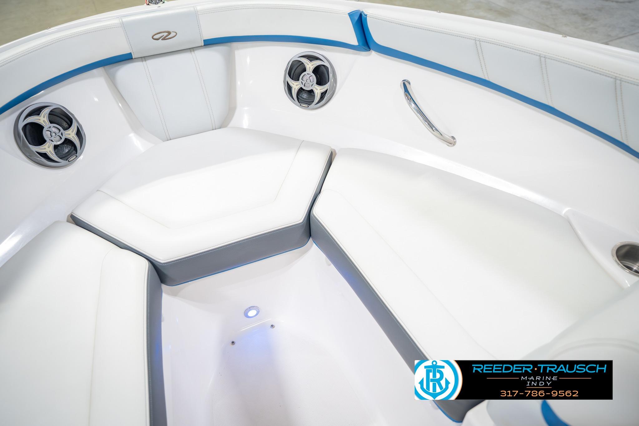 2015 Regal 2000 ESX Bowrider interior with white seating and blue accents.