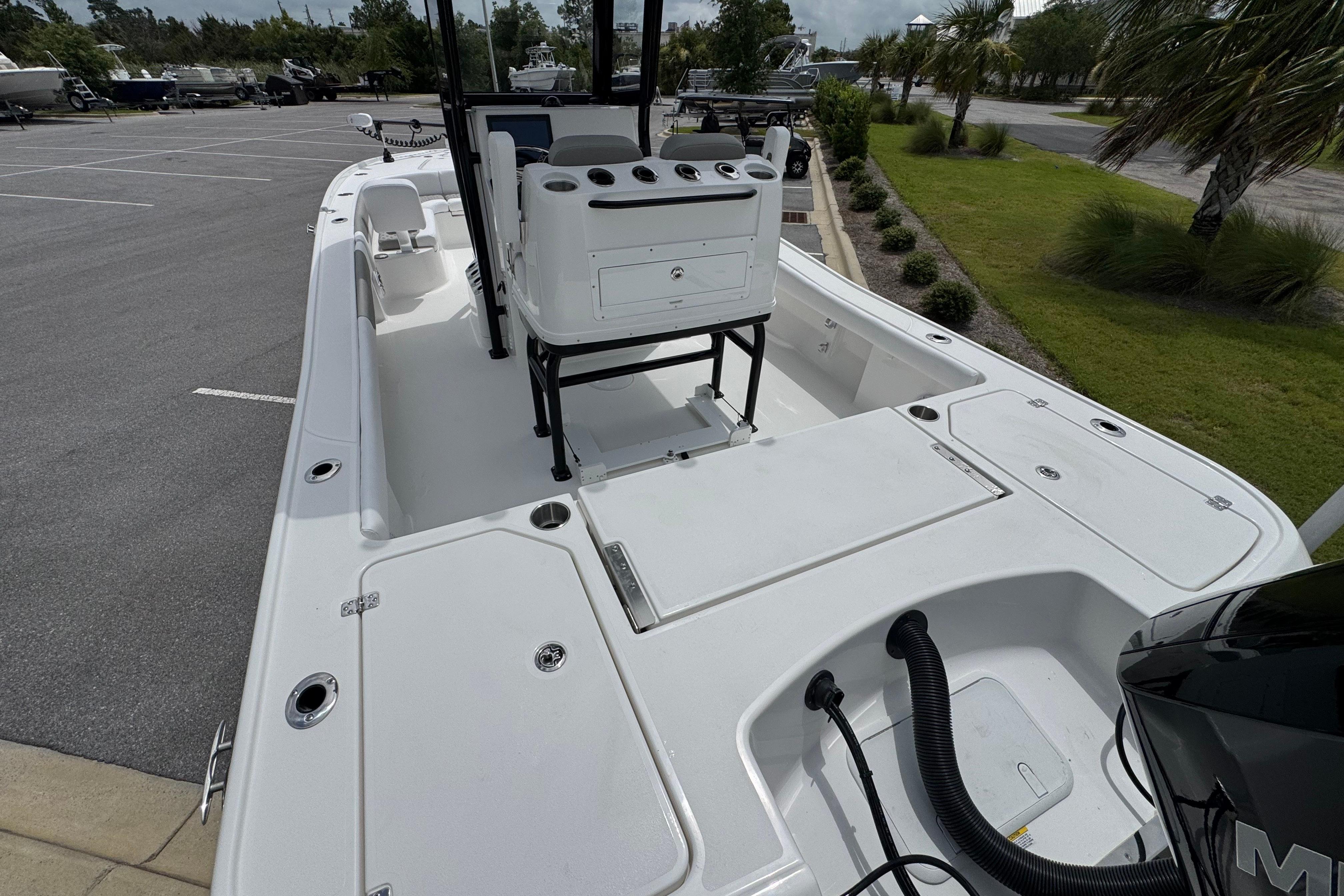 2027 Caymas 26 HB boat interior, featuring spacious deck and modern console design.