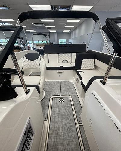 2024 Bayliner DX 2050 boat interior with modern seating and sleek design.
