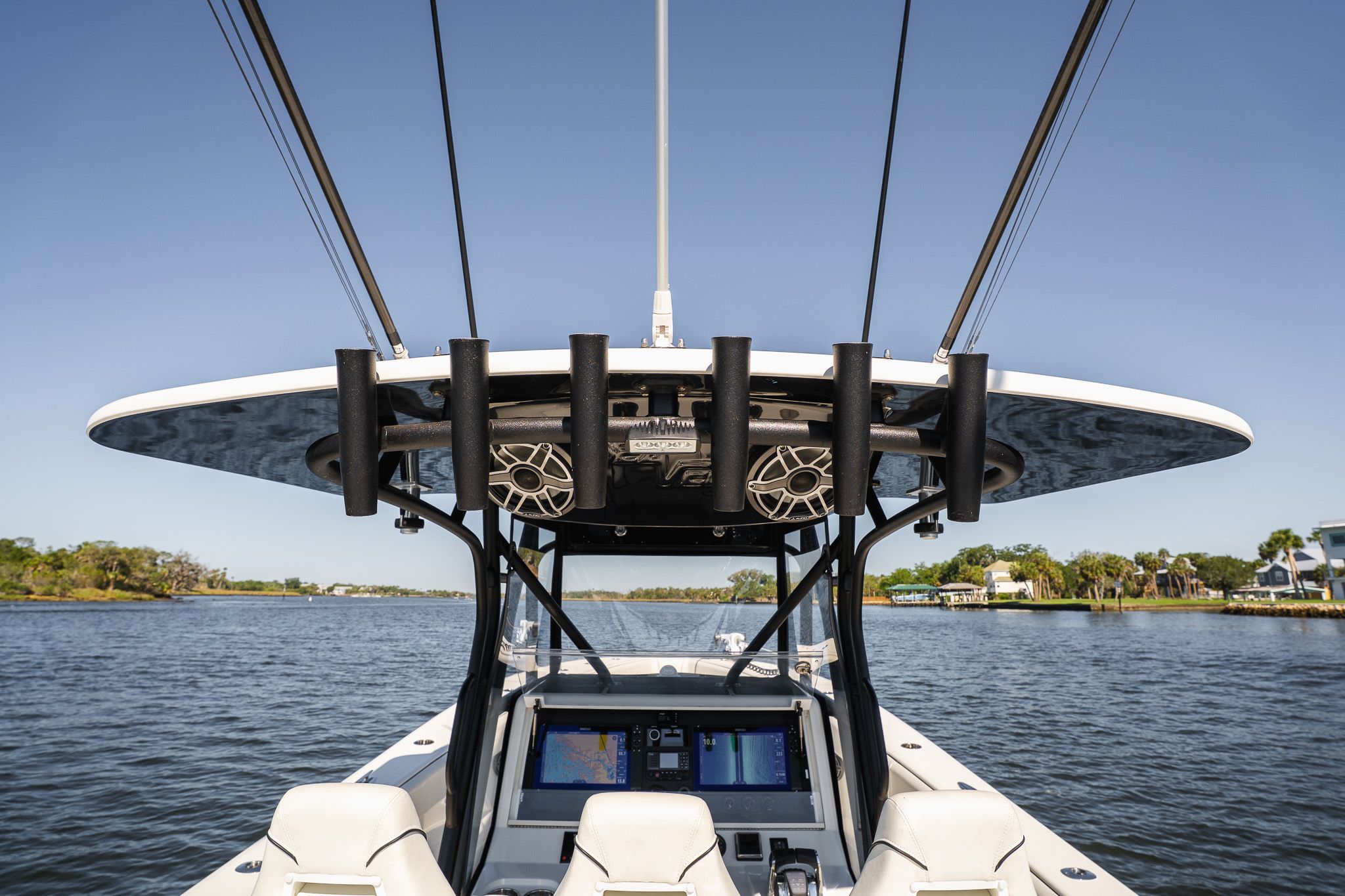 The image shows the cockpit of a SeaVee 370Z boat on the water.