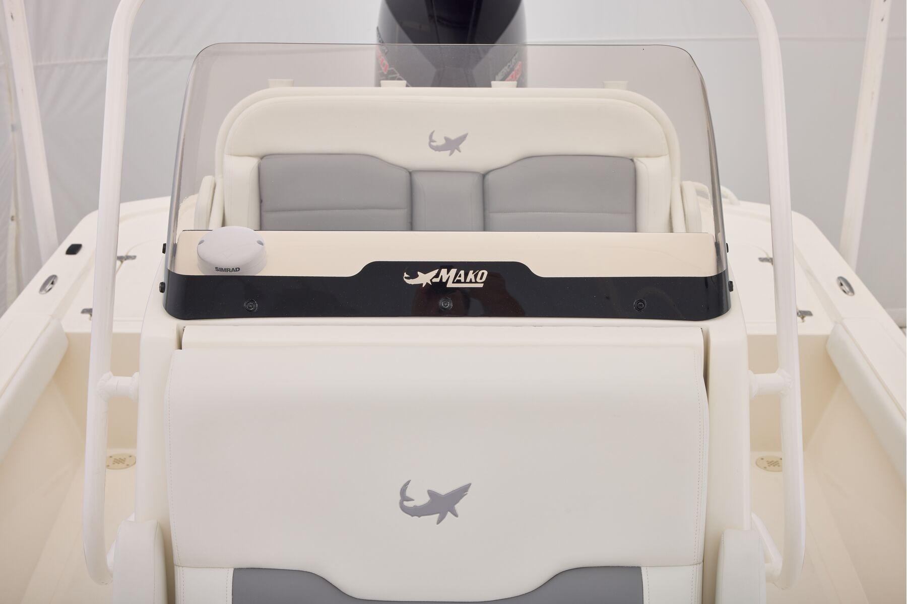 2026 Mako 24 APEX boat interior with logo and seating details.