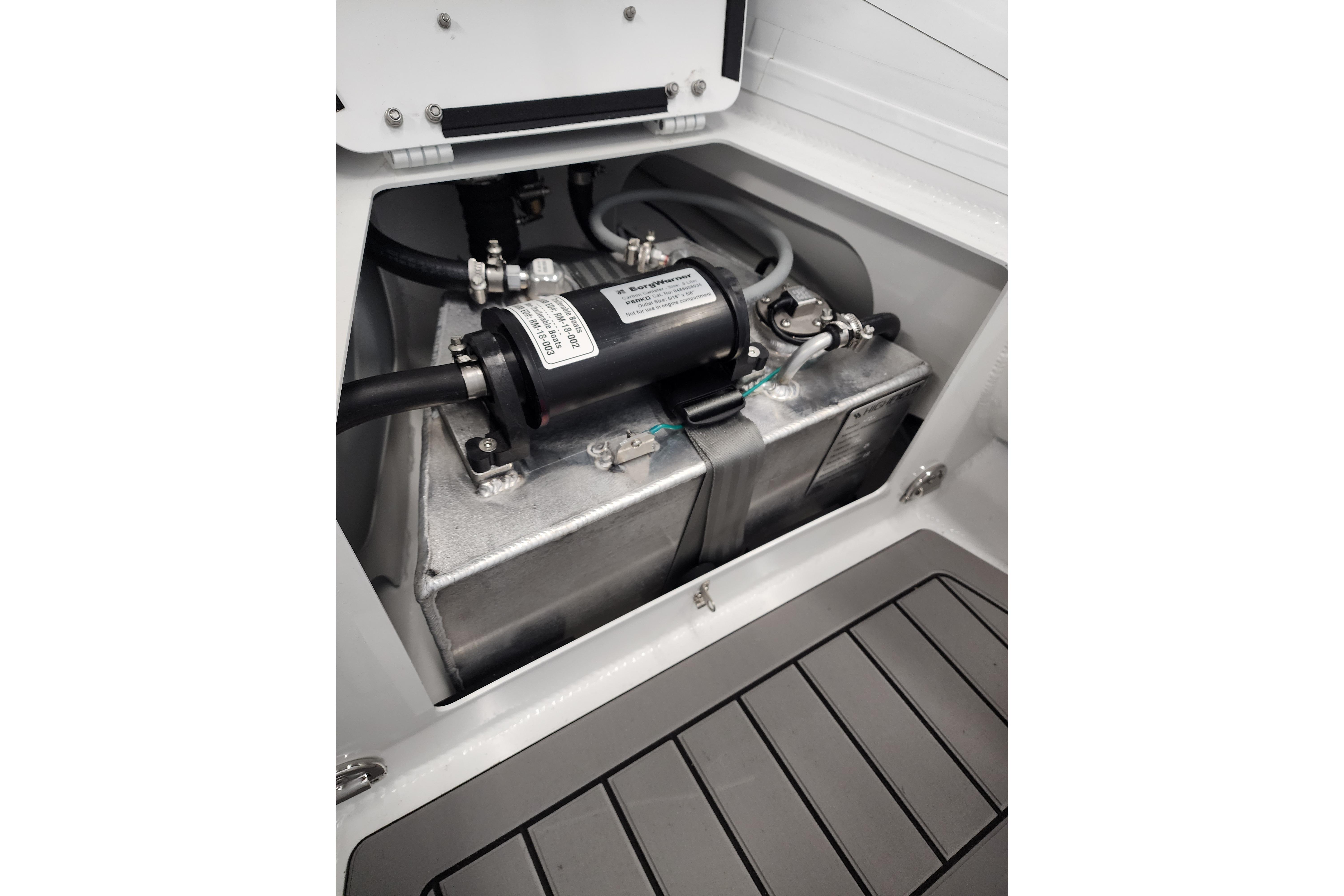 2025 Highfield Sport 390 boat engine compartment with visible components and wiring.