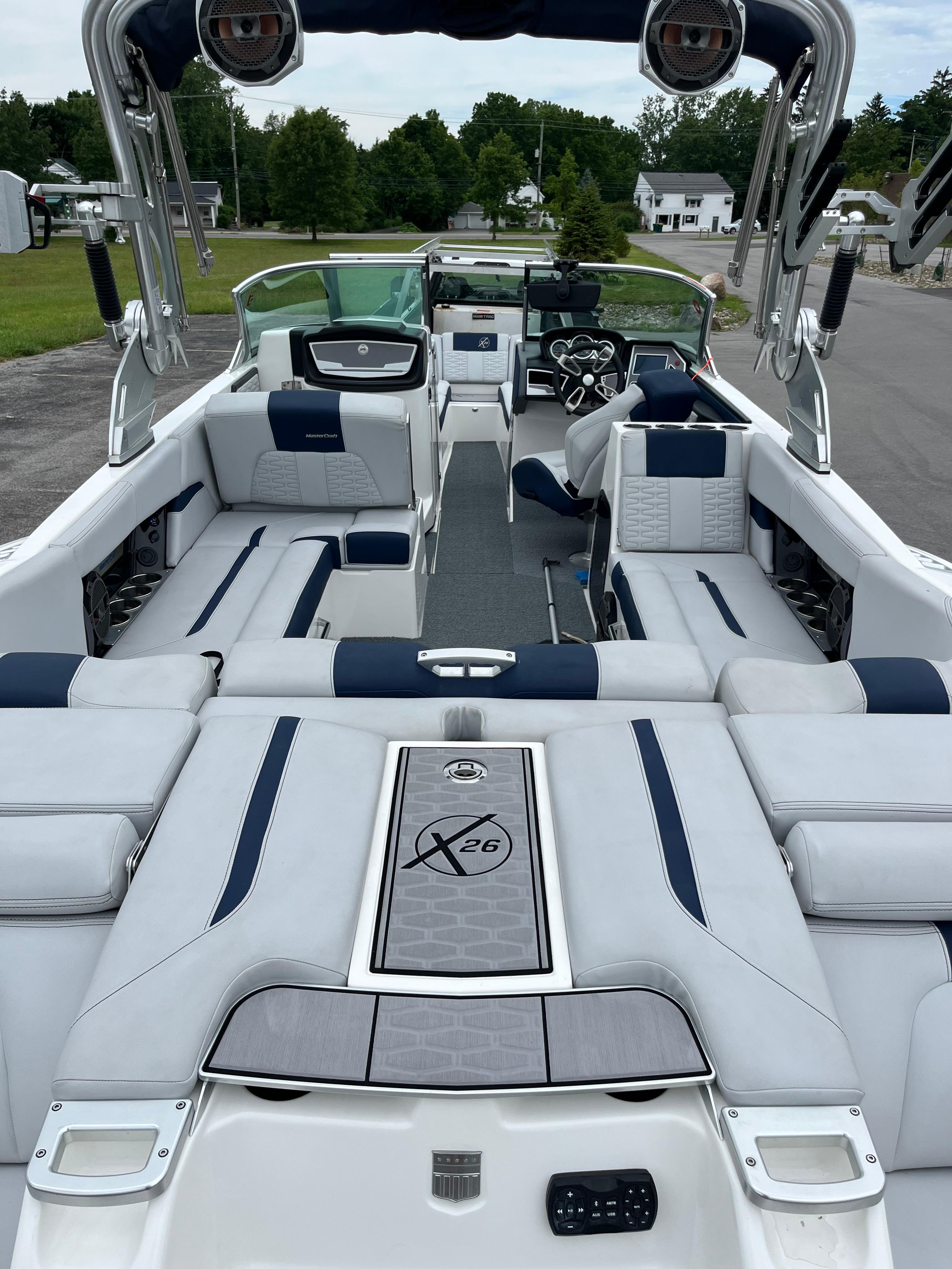 2019 MasterCraft X26 boat interior with luxurious seating and modern design.