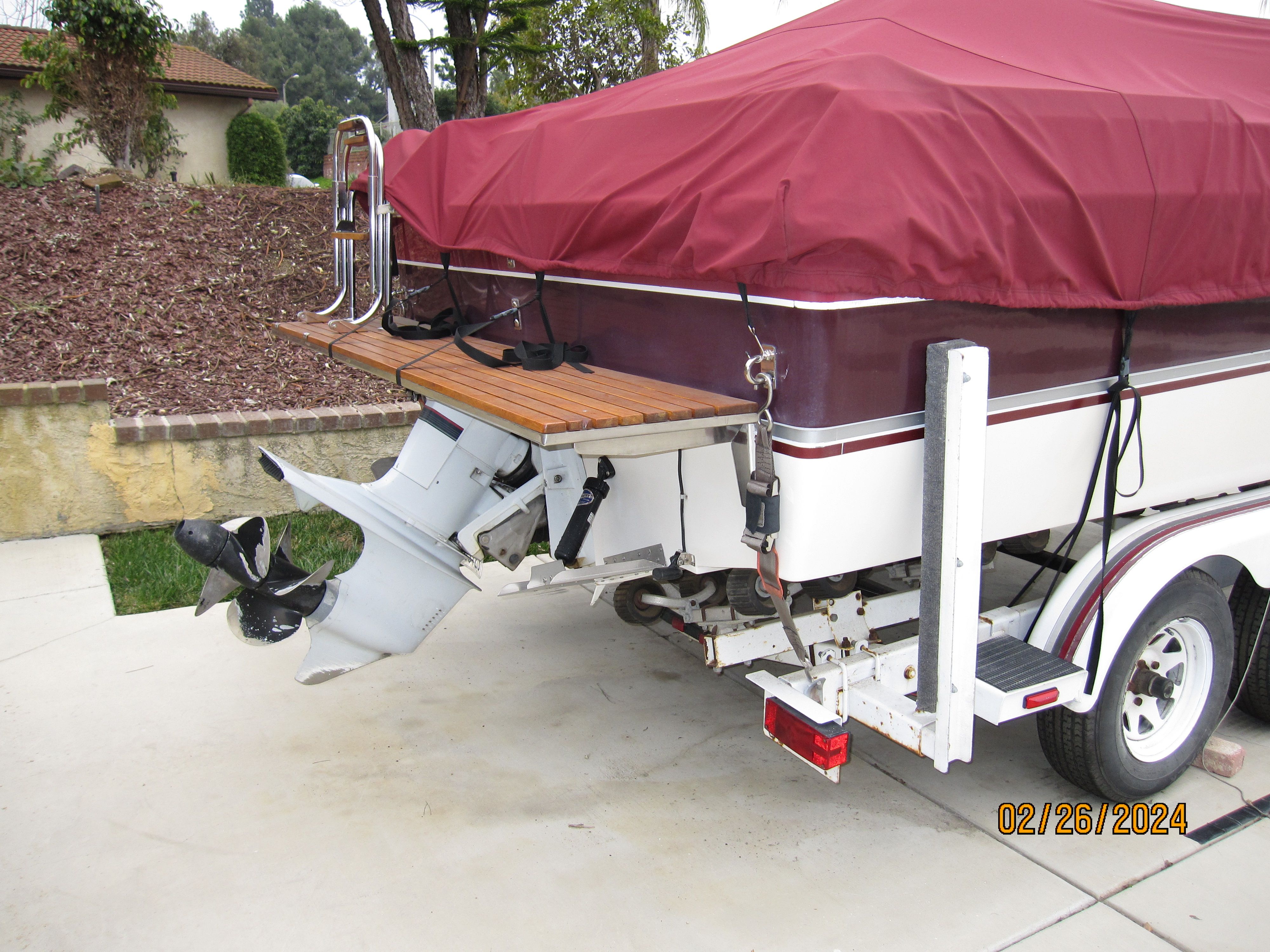 1990 Cobalt Bowrider Classic with cover on trailer.