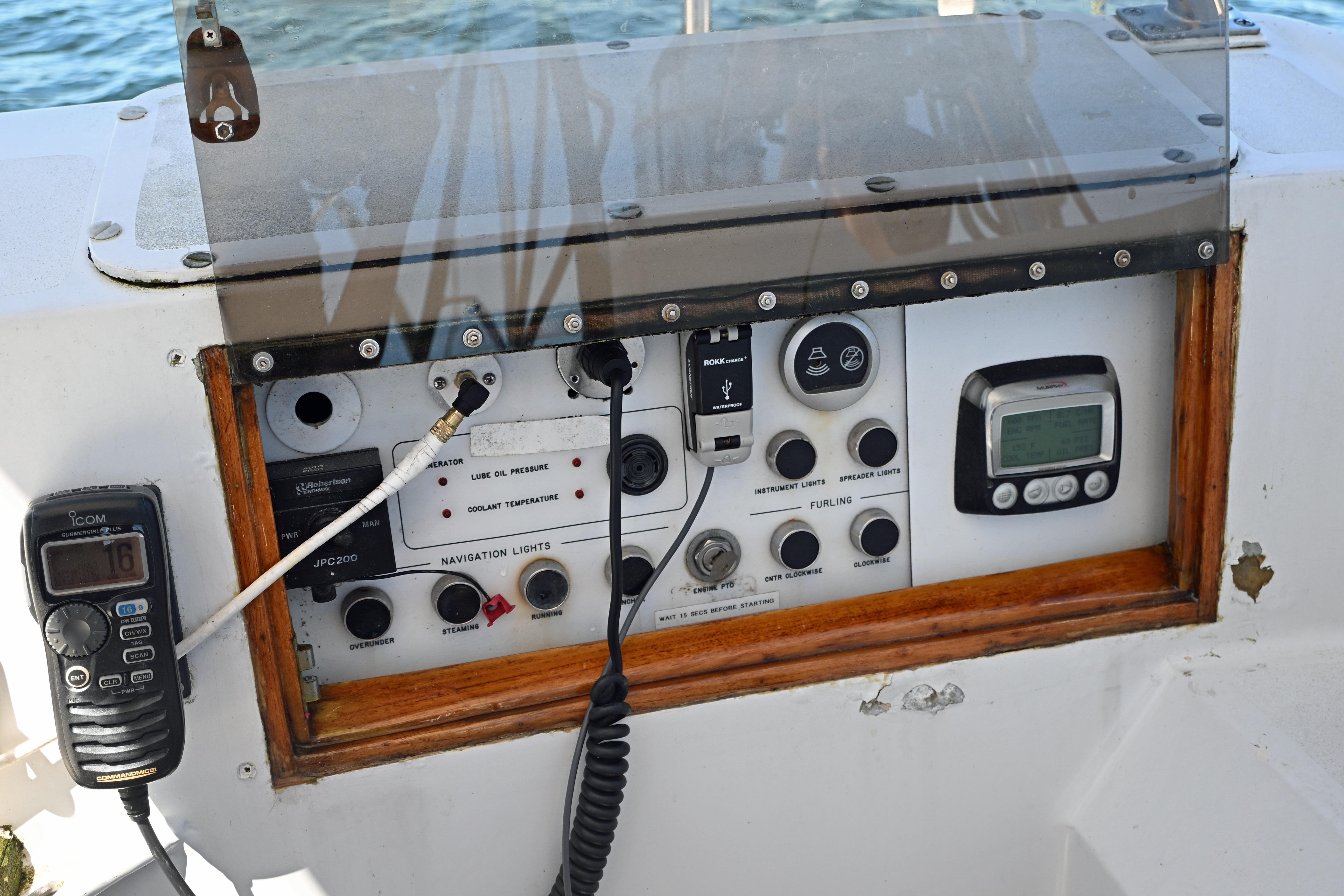 Control panel of a 1968 Abeking & Rasmussen Tripp 74 yacht with navigation instruments.