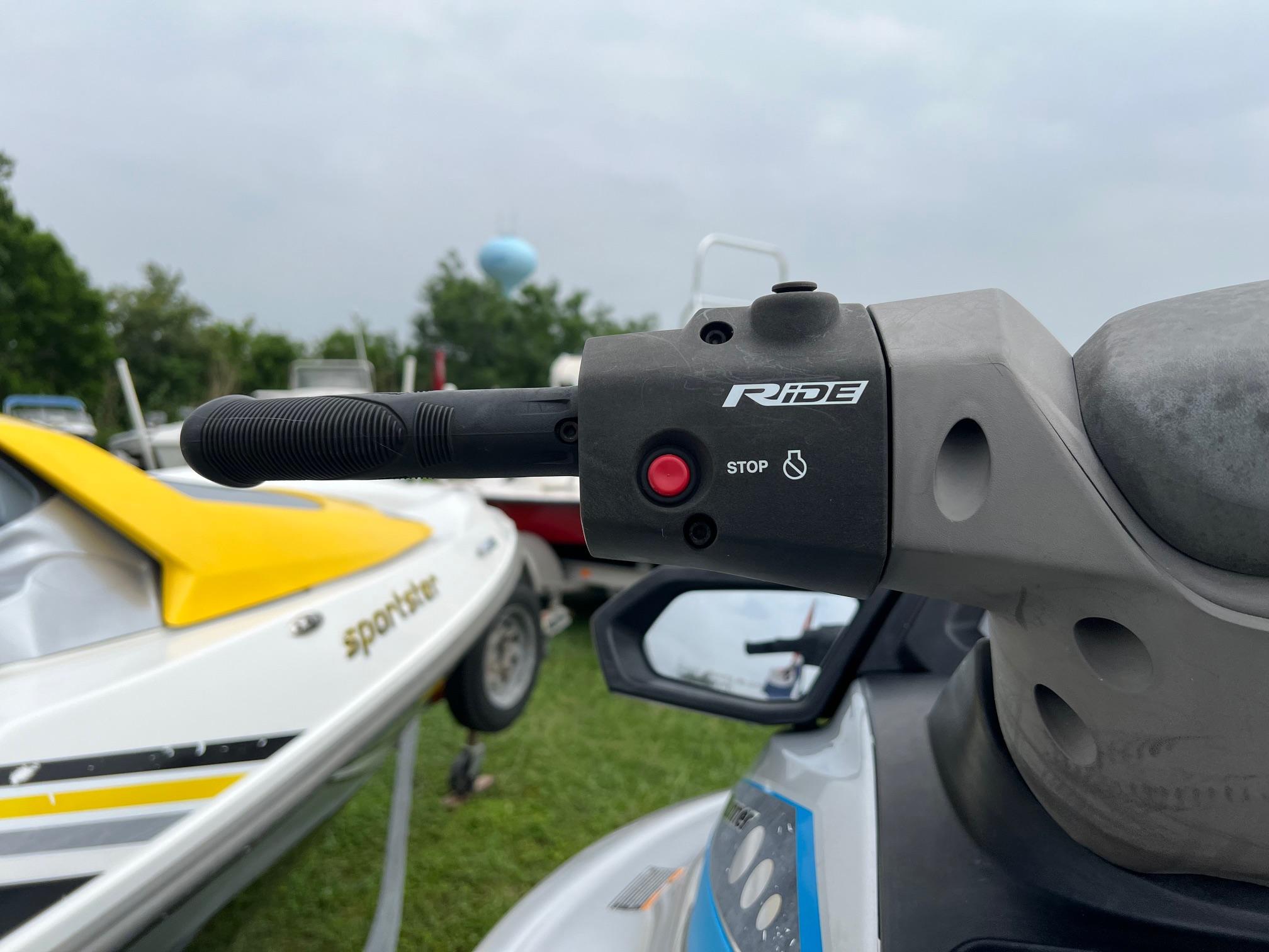 Close-up of 2015 Yamaha WaveRunner VX Deluxe handlebar with stop button.