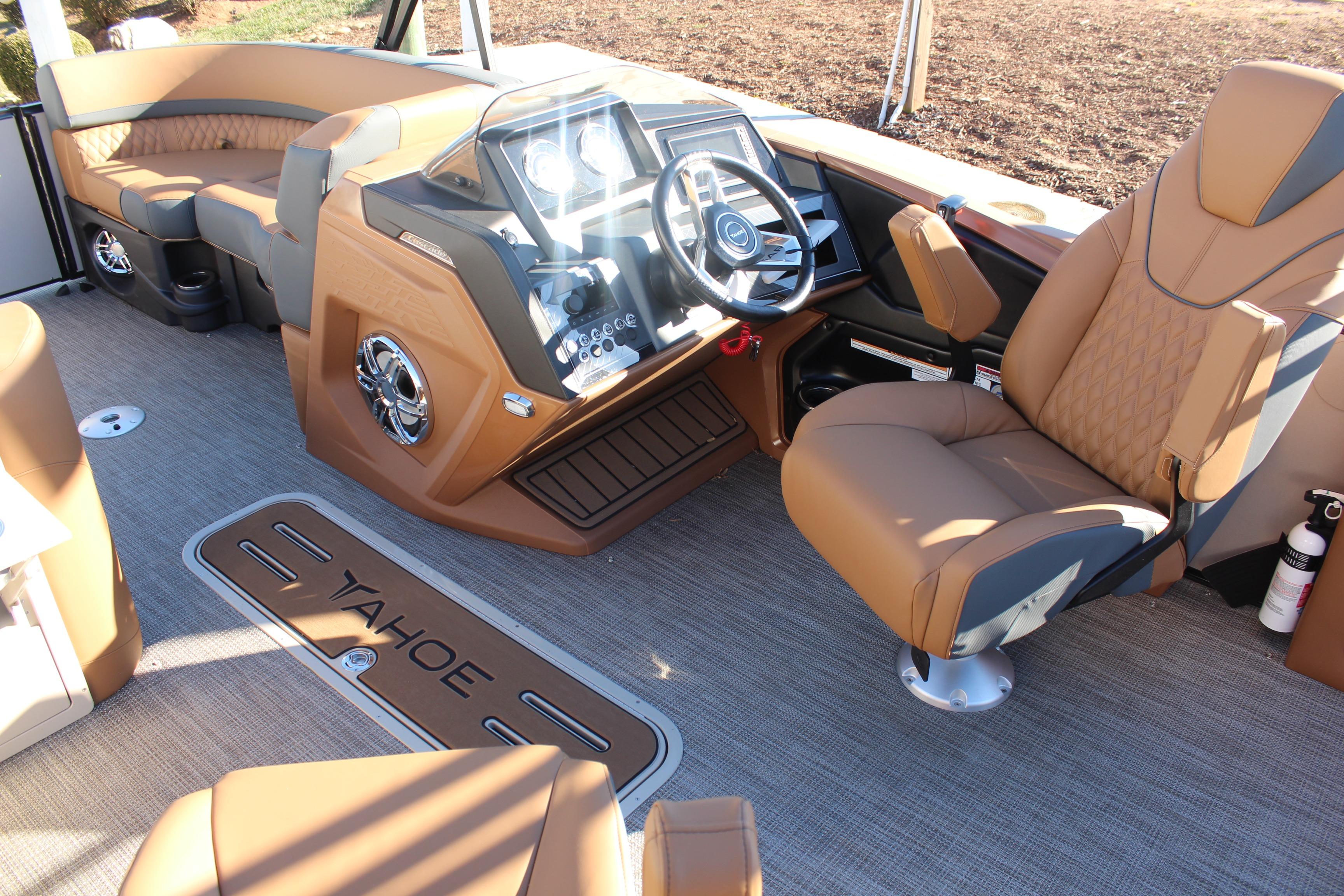 Luxurious interior of 2026 Tahoe Pontoon Cascade Versatile Rear Bench with plush seating and modern dashboard.