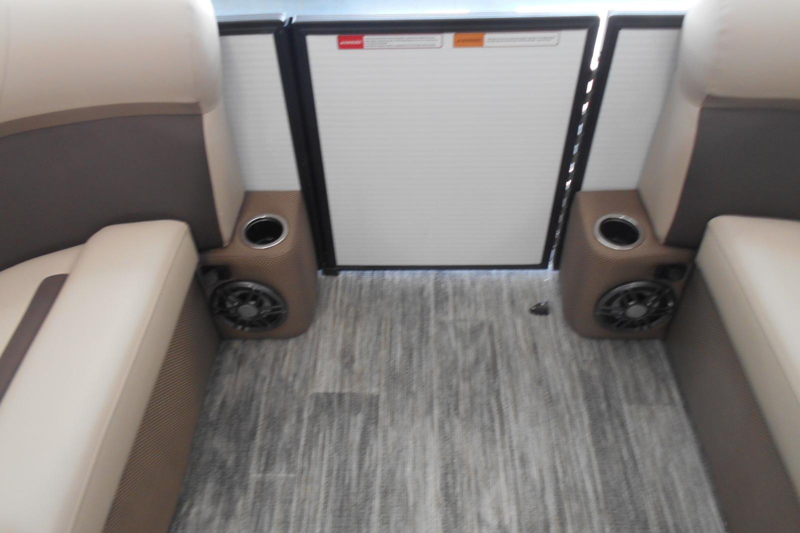 Interior of 2025 Crest Classic LX 200 SLC boat with seating and cup holders.