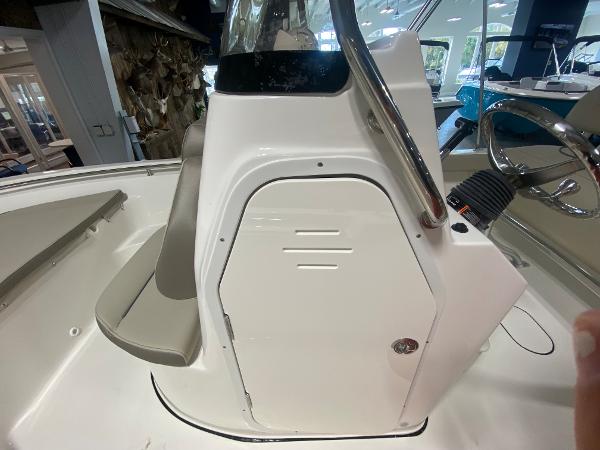 2024 Key West 189 FS center console boat interior with steering wheel and seating.