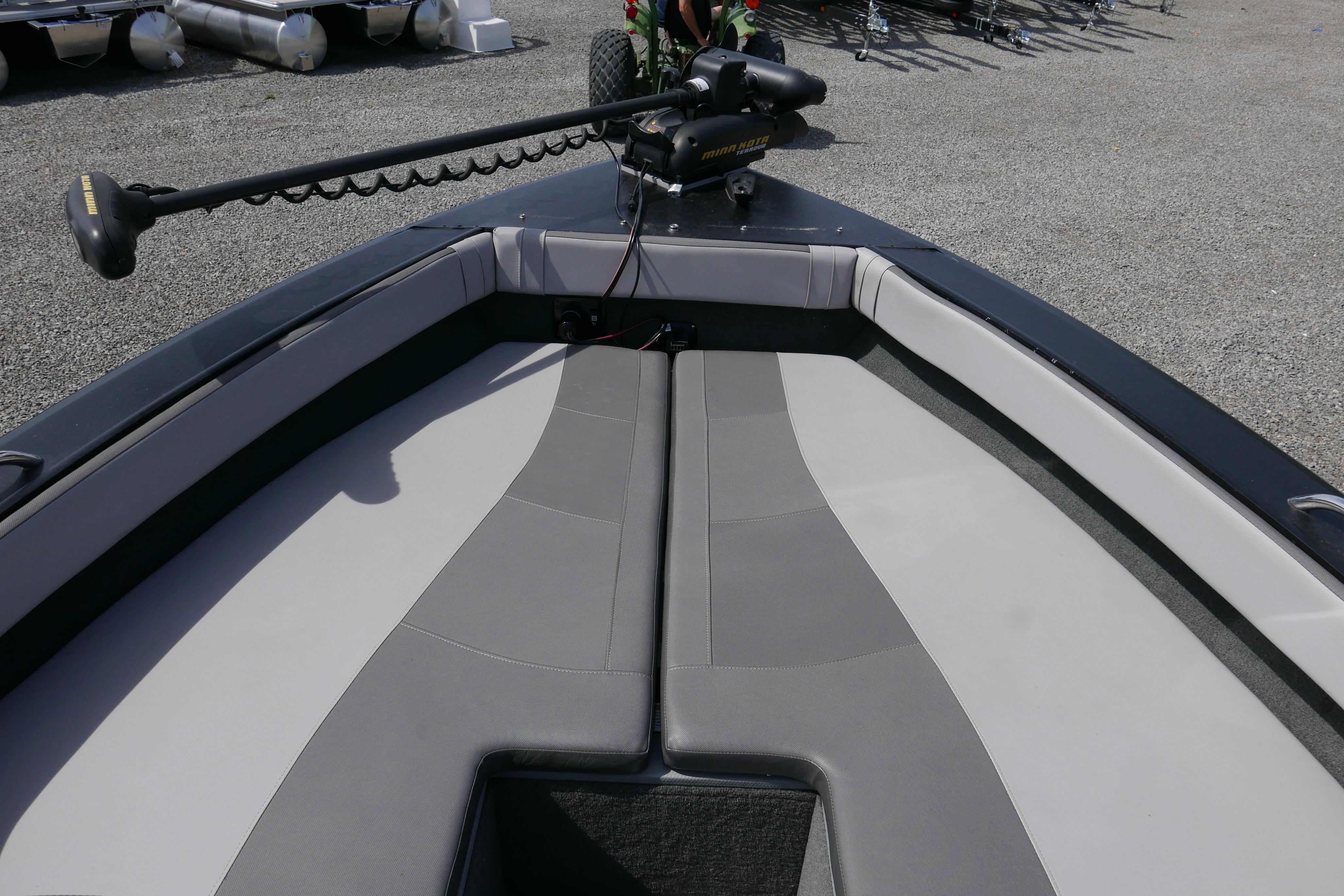 2016 Starcraft Titan 186 boat interior with gray seating and trolling motor.